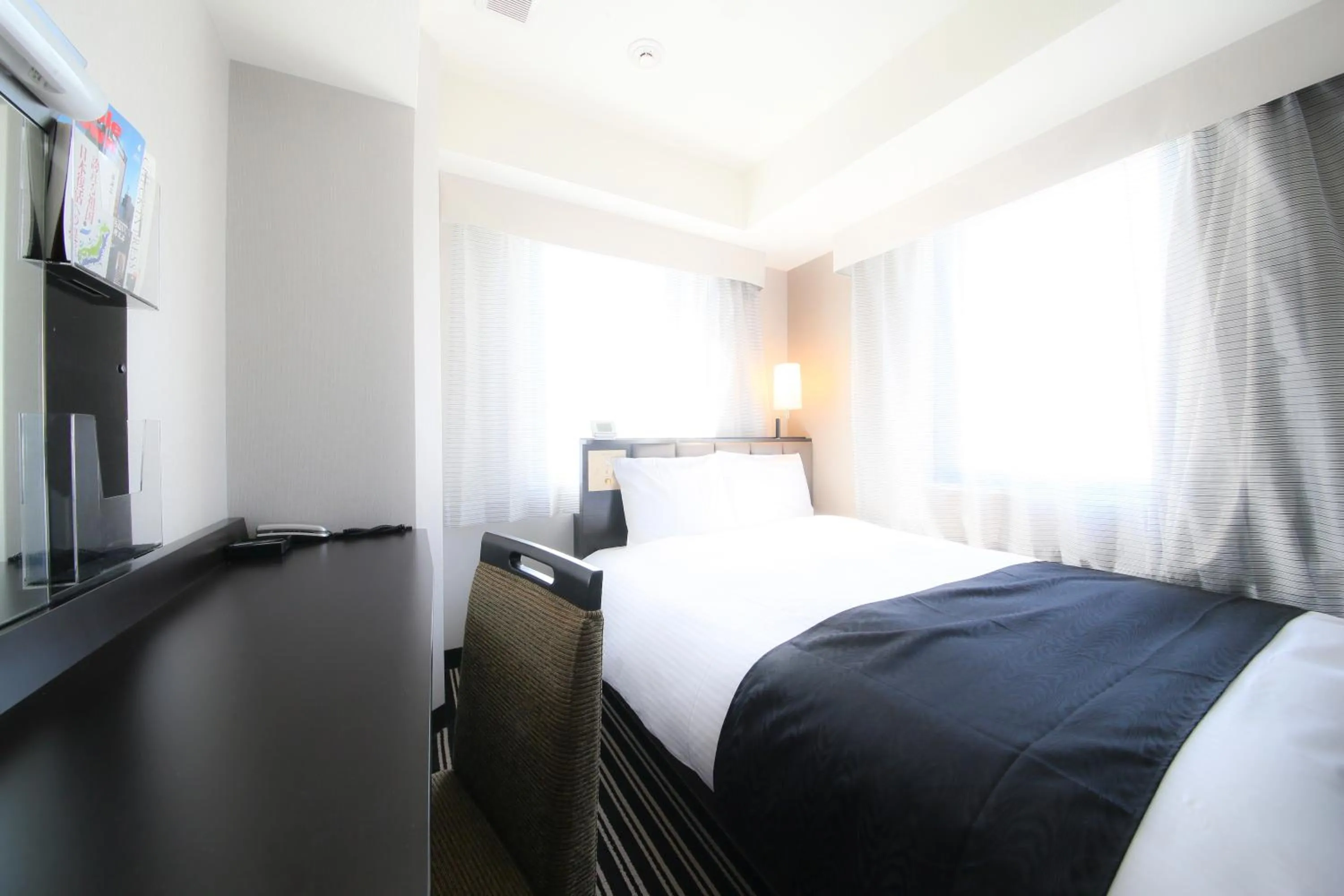 Bed in APA Hotel Ginza Takaracho Tokyo Eki Yaesu Minamiguchi