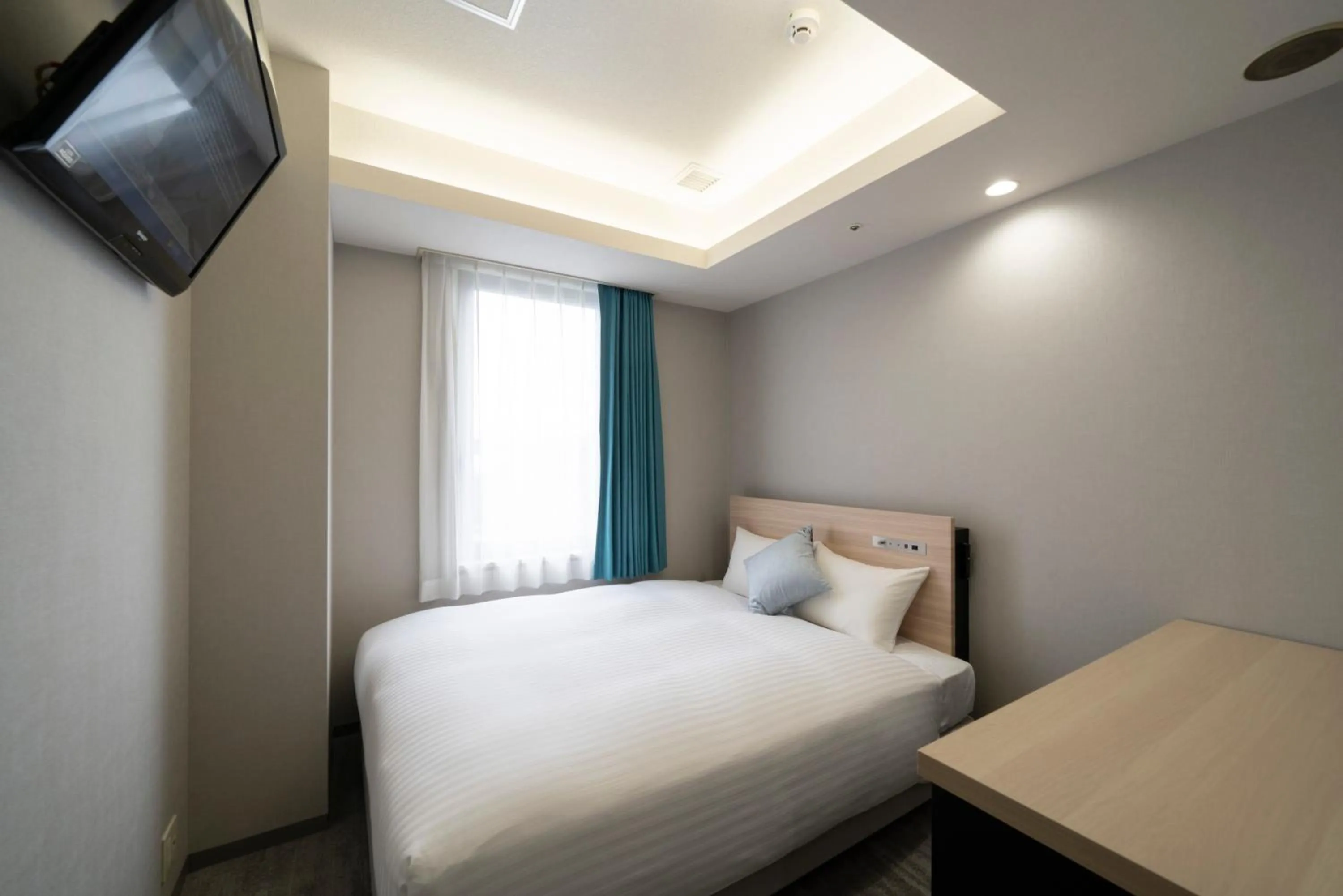 Photo of the whole room, Bed in Hotel Oriental Express Fukuoka Tenjin