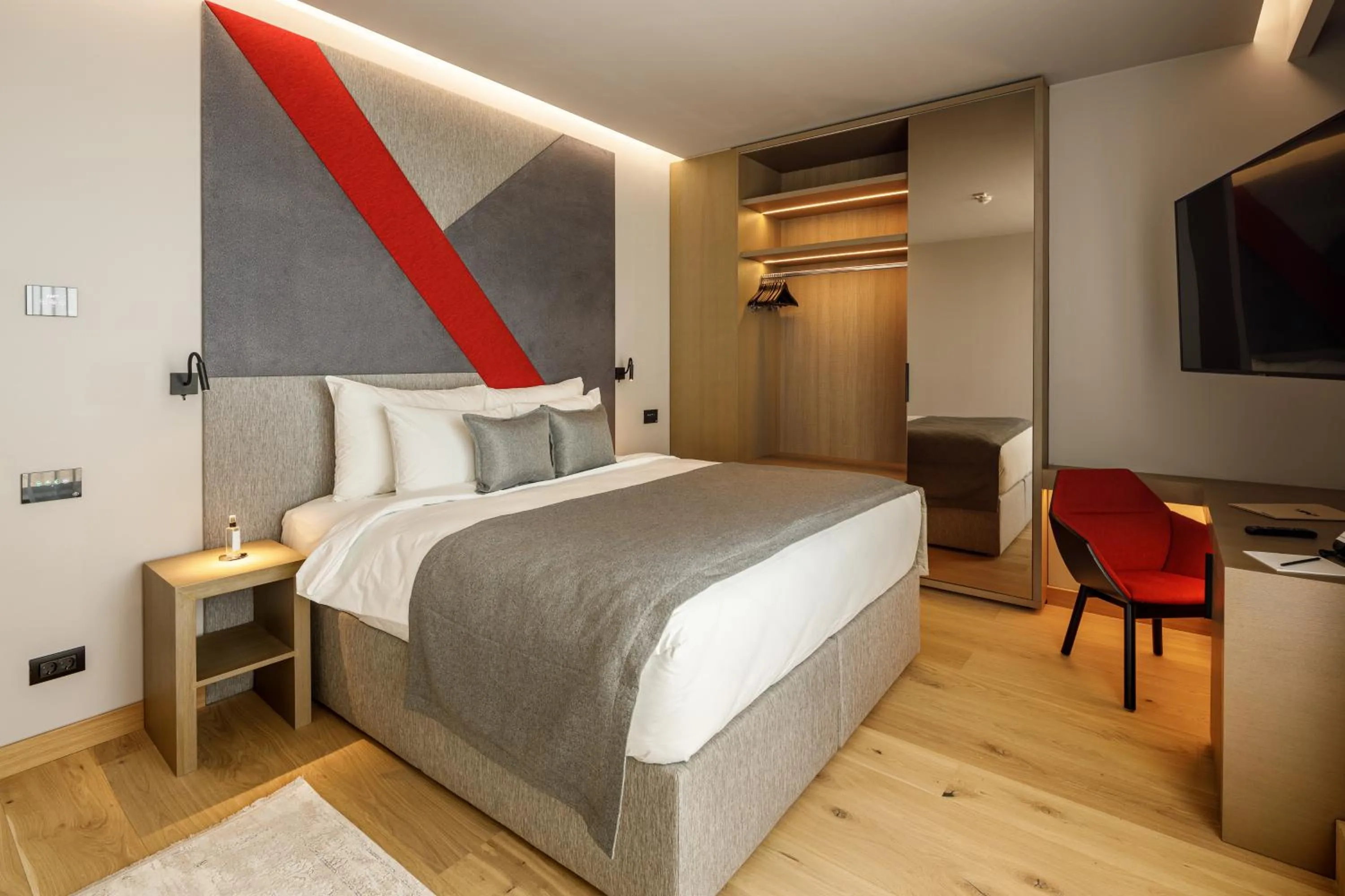 Bed in Qosmo Brasov Hotel