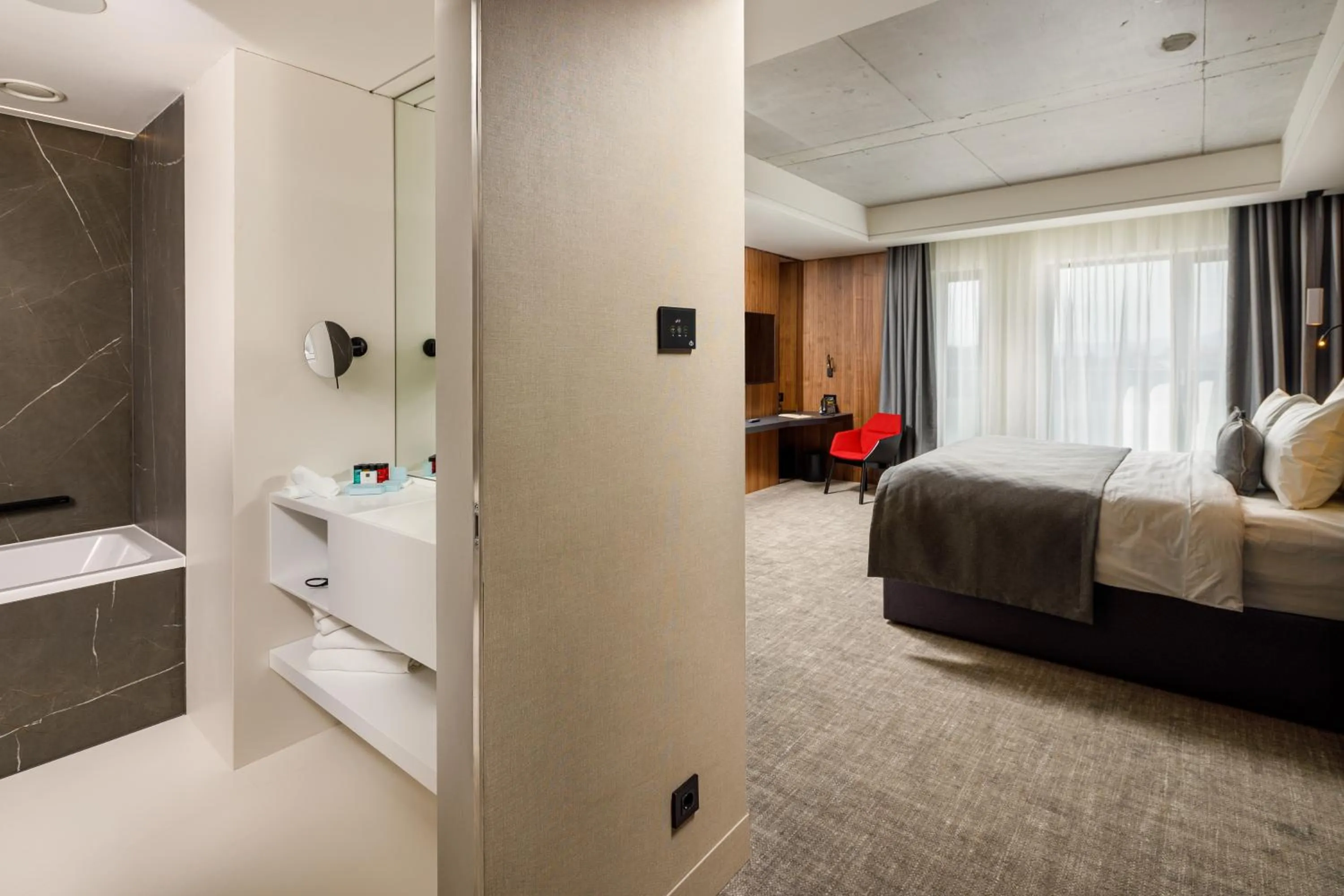 Bed in Qosmo Brasov Hotel