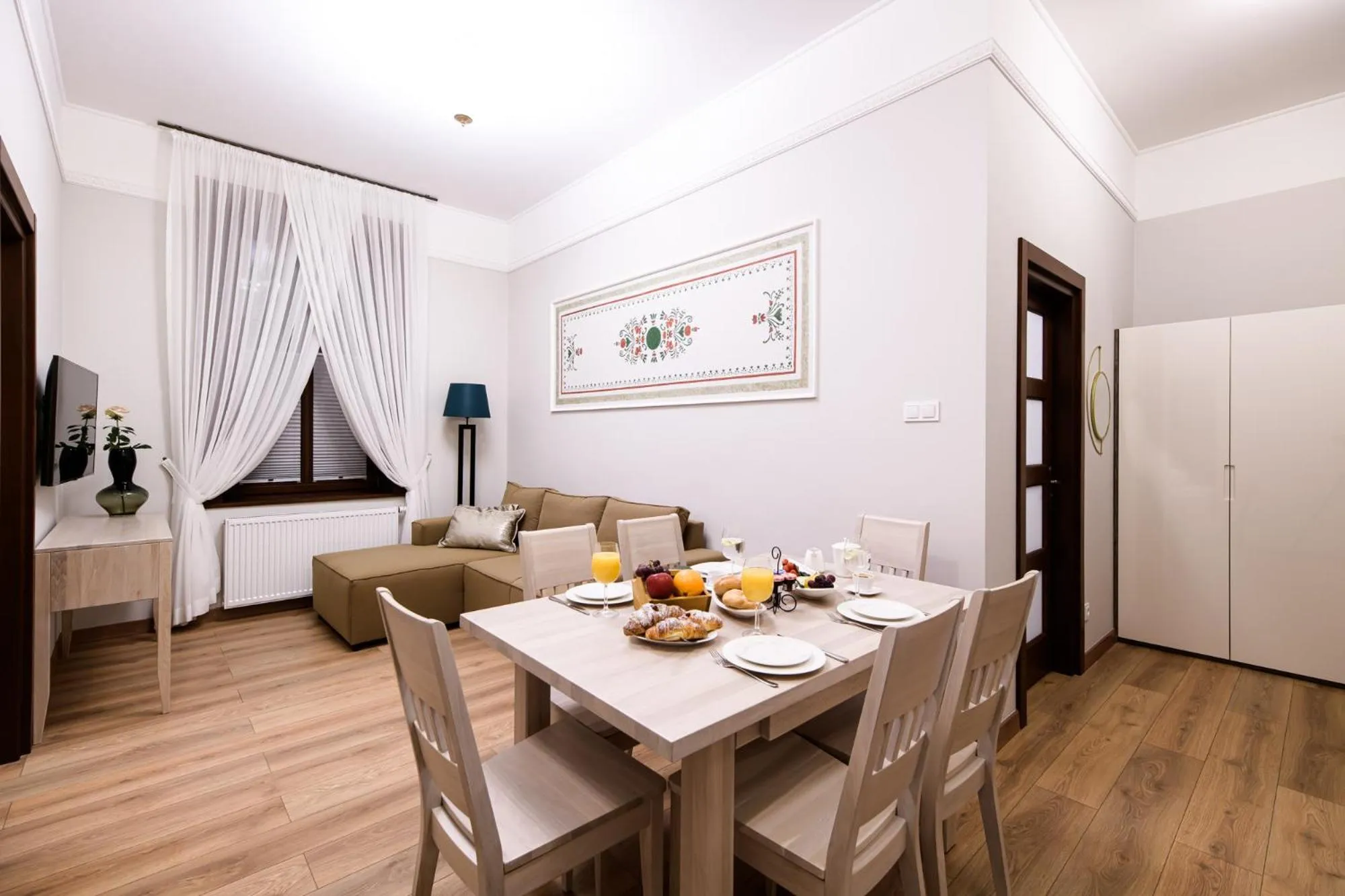 Seating area in Apart Residence Ariańska 16 by NEARTO PL