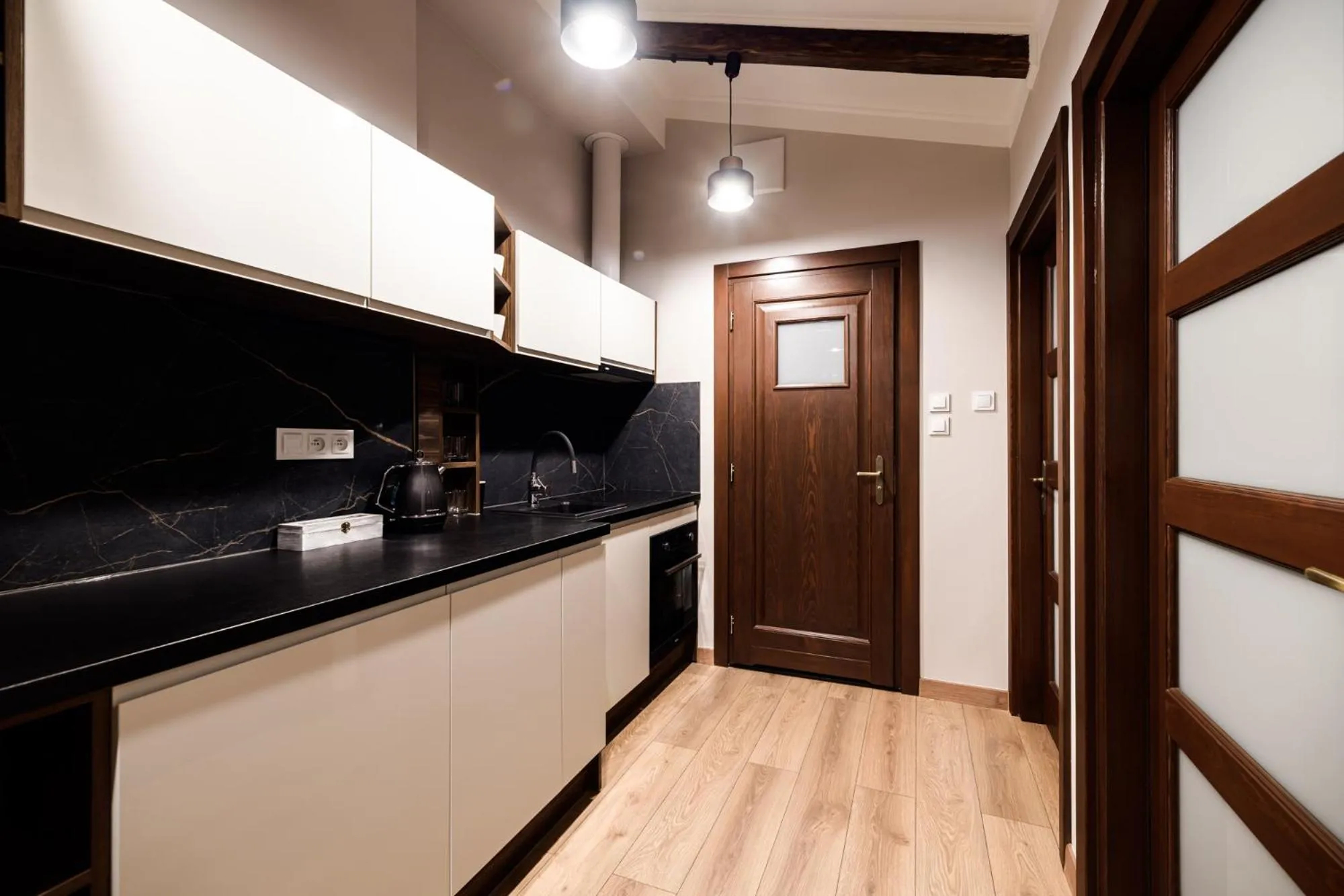 Kitchen or kitchenette in Apart Residence Ariańska 16 by NEARTO PL