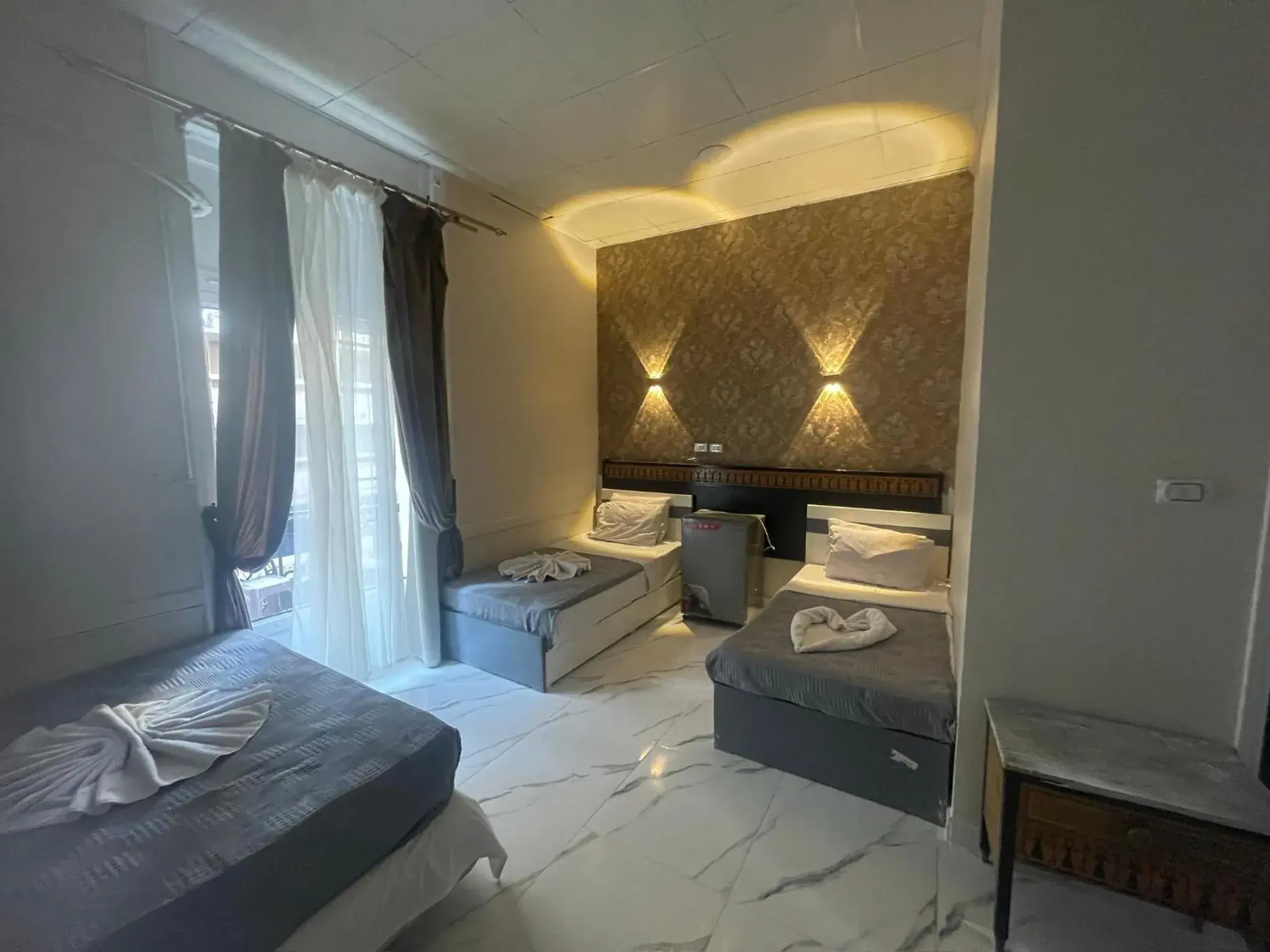 Quadruple Room with Private Bathroom in One Season Cairo Quadruple Room with Private Bathroom in One Season Cairo