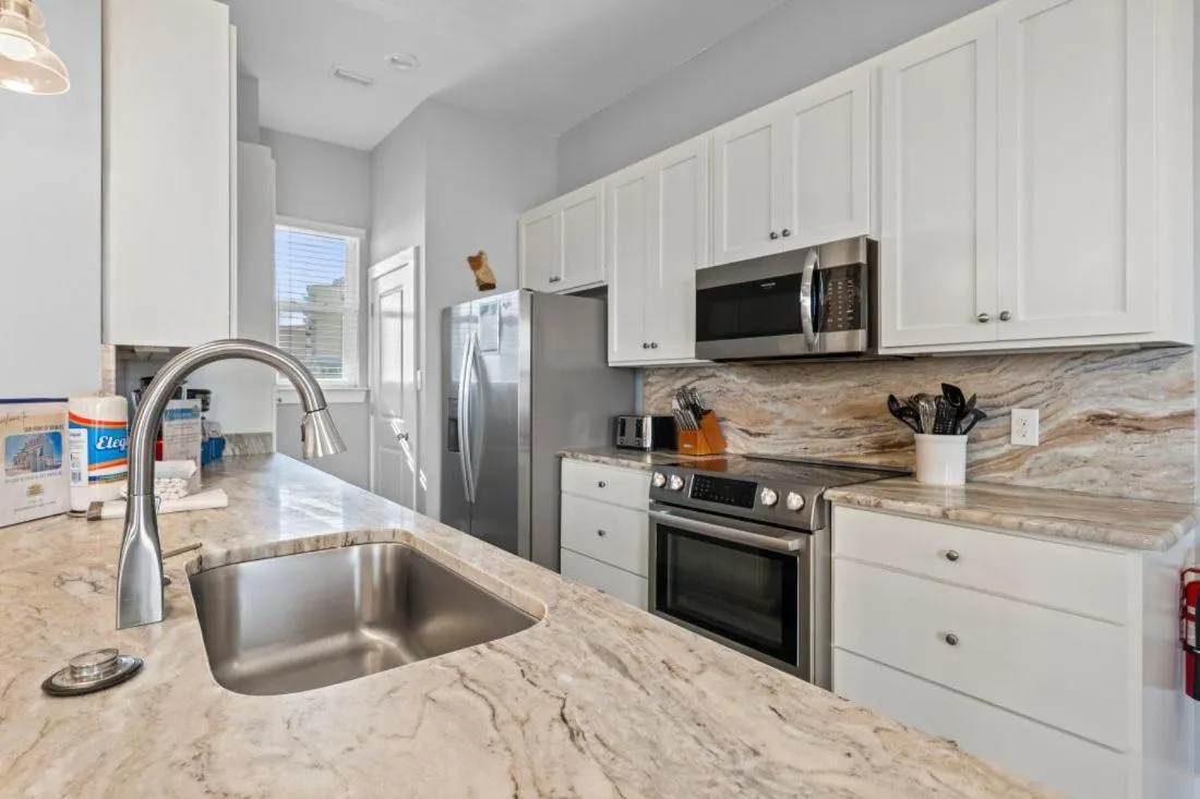 Kitchen or kitchenette in Two Little Lambs at Our Point of View by Youngs Suncoast