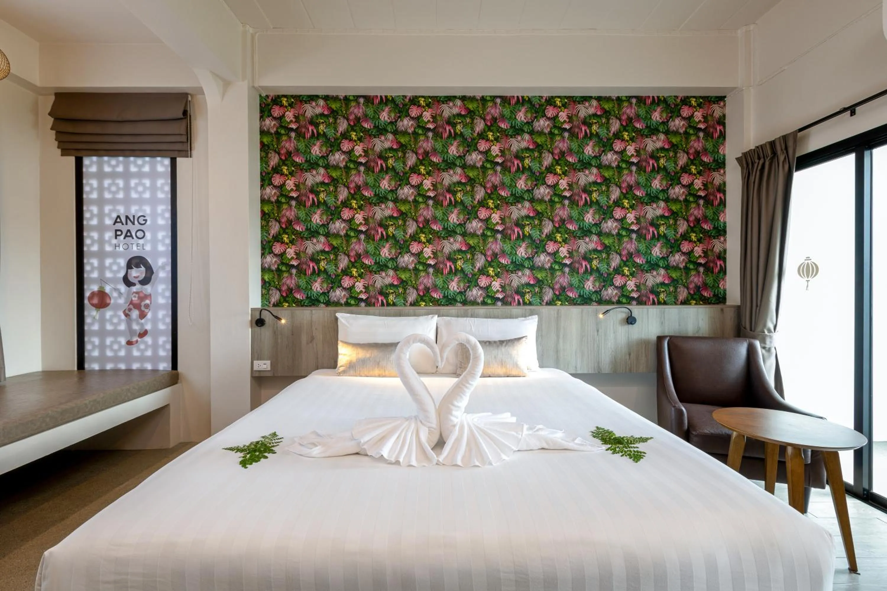 Bed in Ang Pao Hotel Phuket