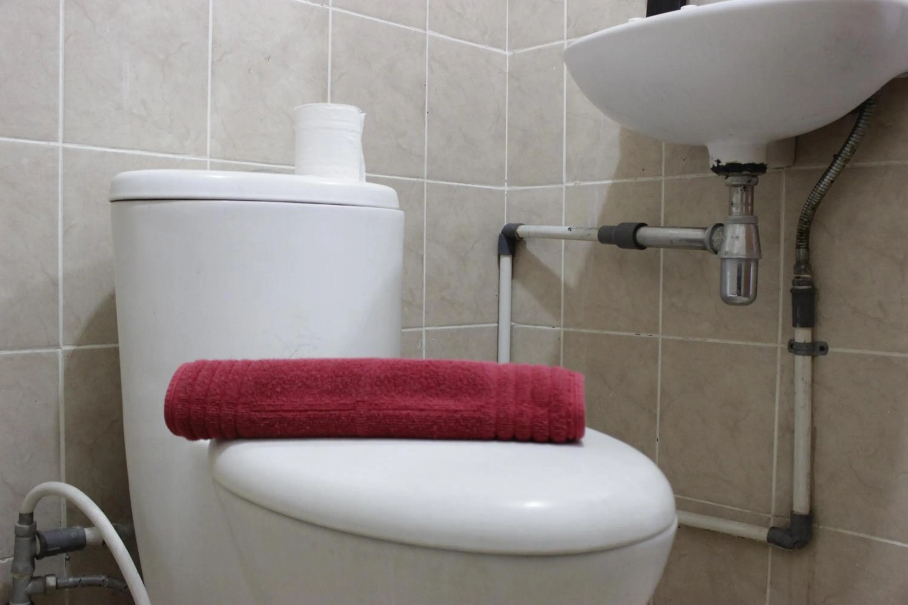 Bathroom in Loft Studio Room at Pinewood Apartment Jatinangor near JATOS By Travelio