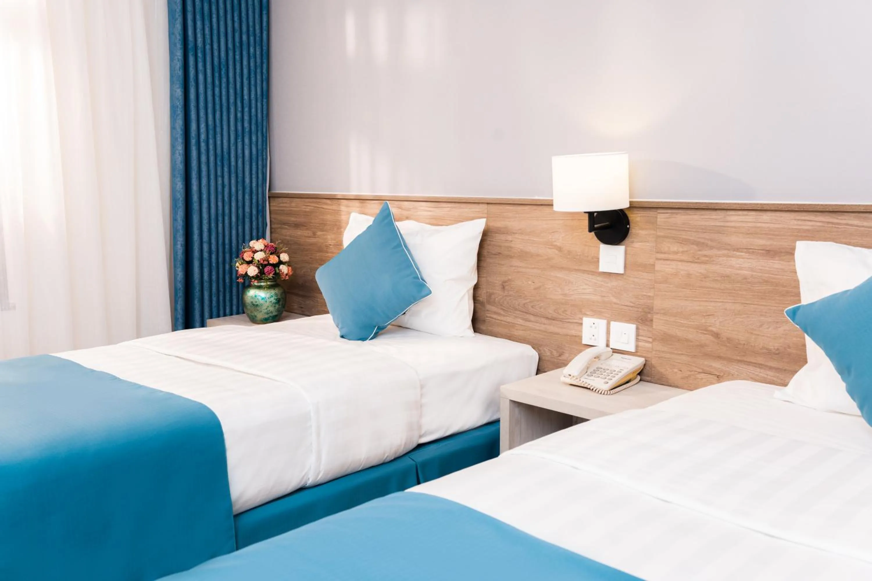 Bedroom, Bed in Capital Garden Hotel