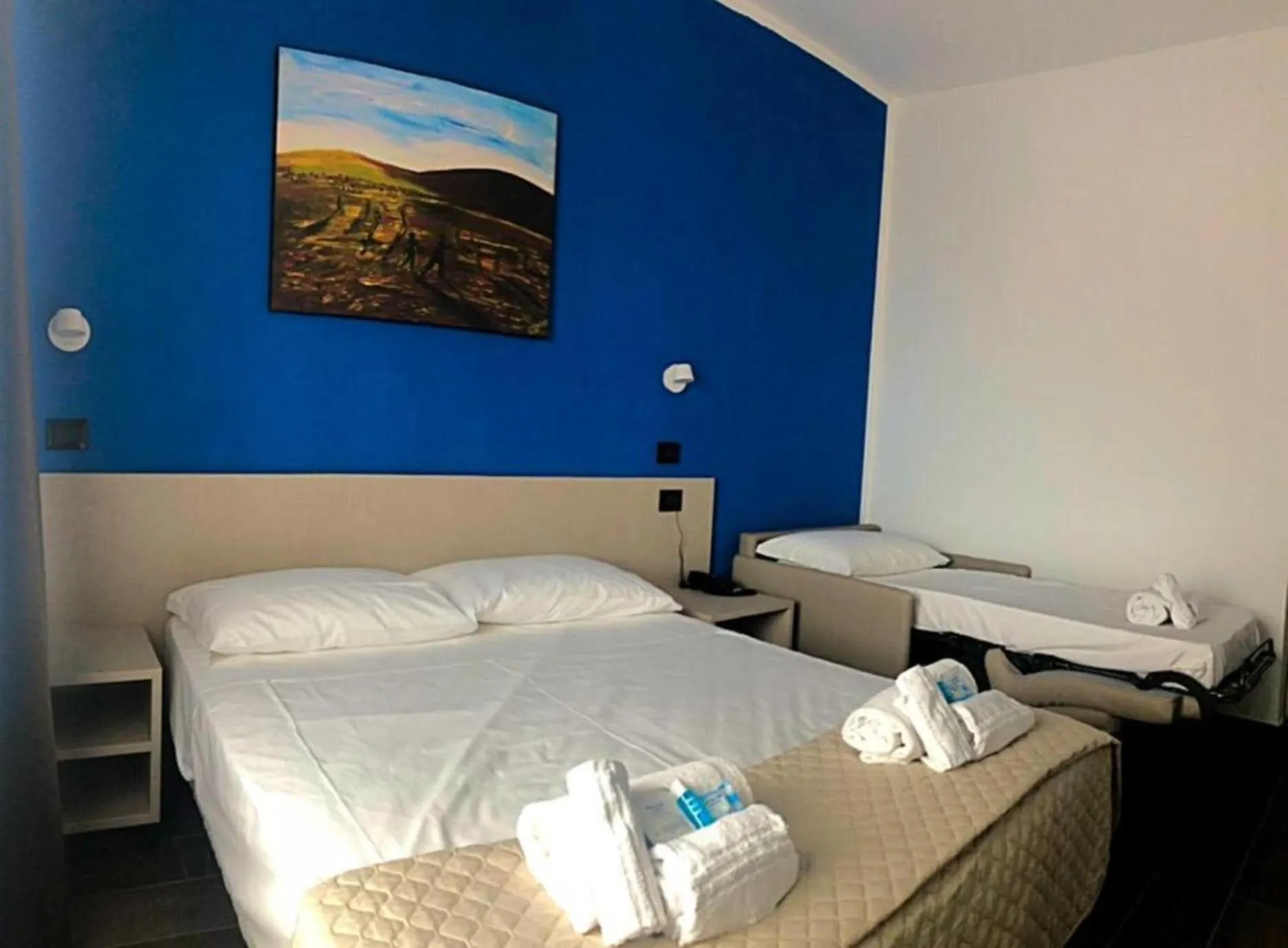 Bed in Hotel Palazzo Caveja