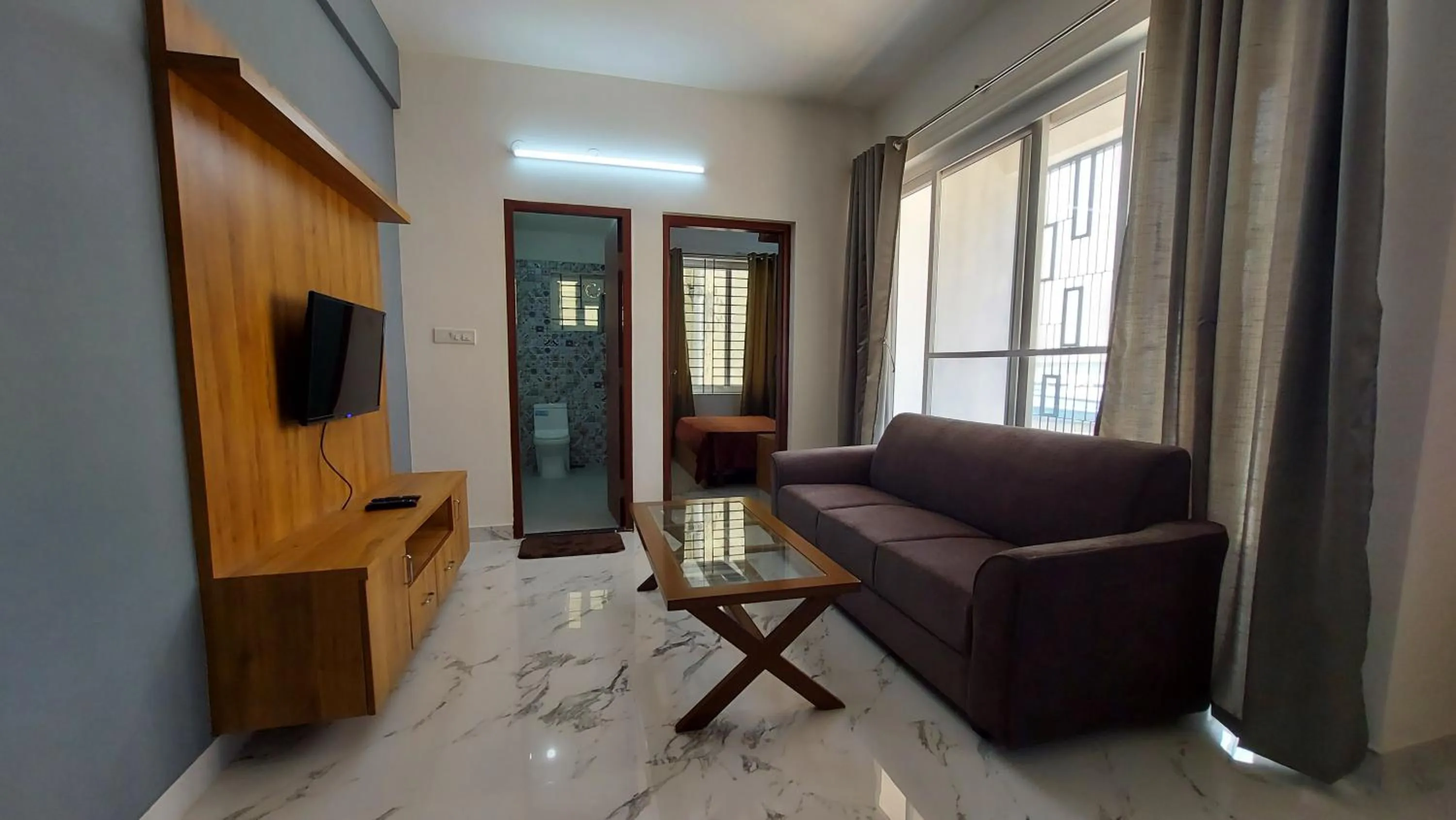 TV and multimedia in Tranquil Serviced Apartments - HSR Layout