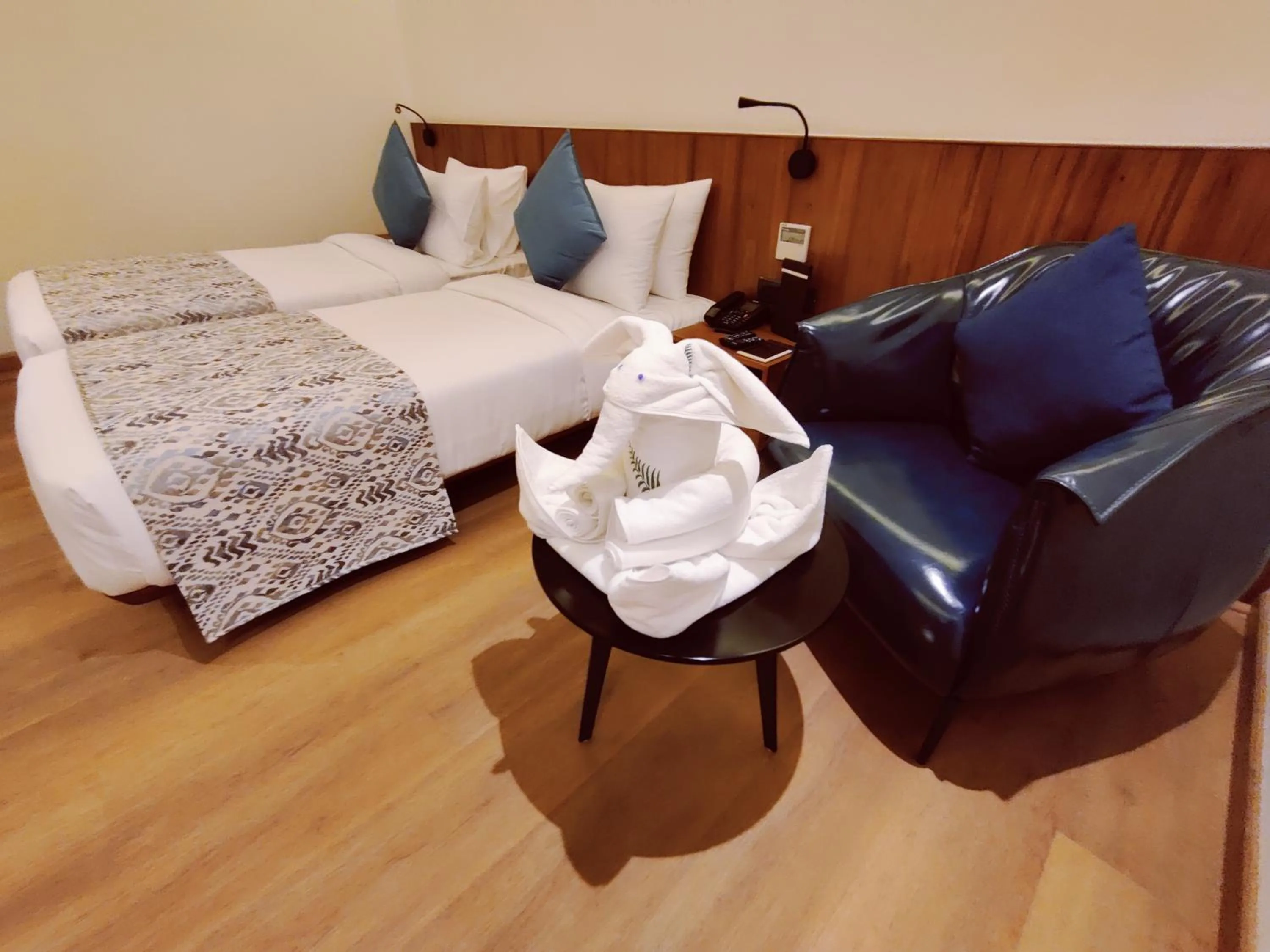 Bed in The Fern Residency, Jamnagar, Series by Marriott