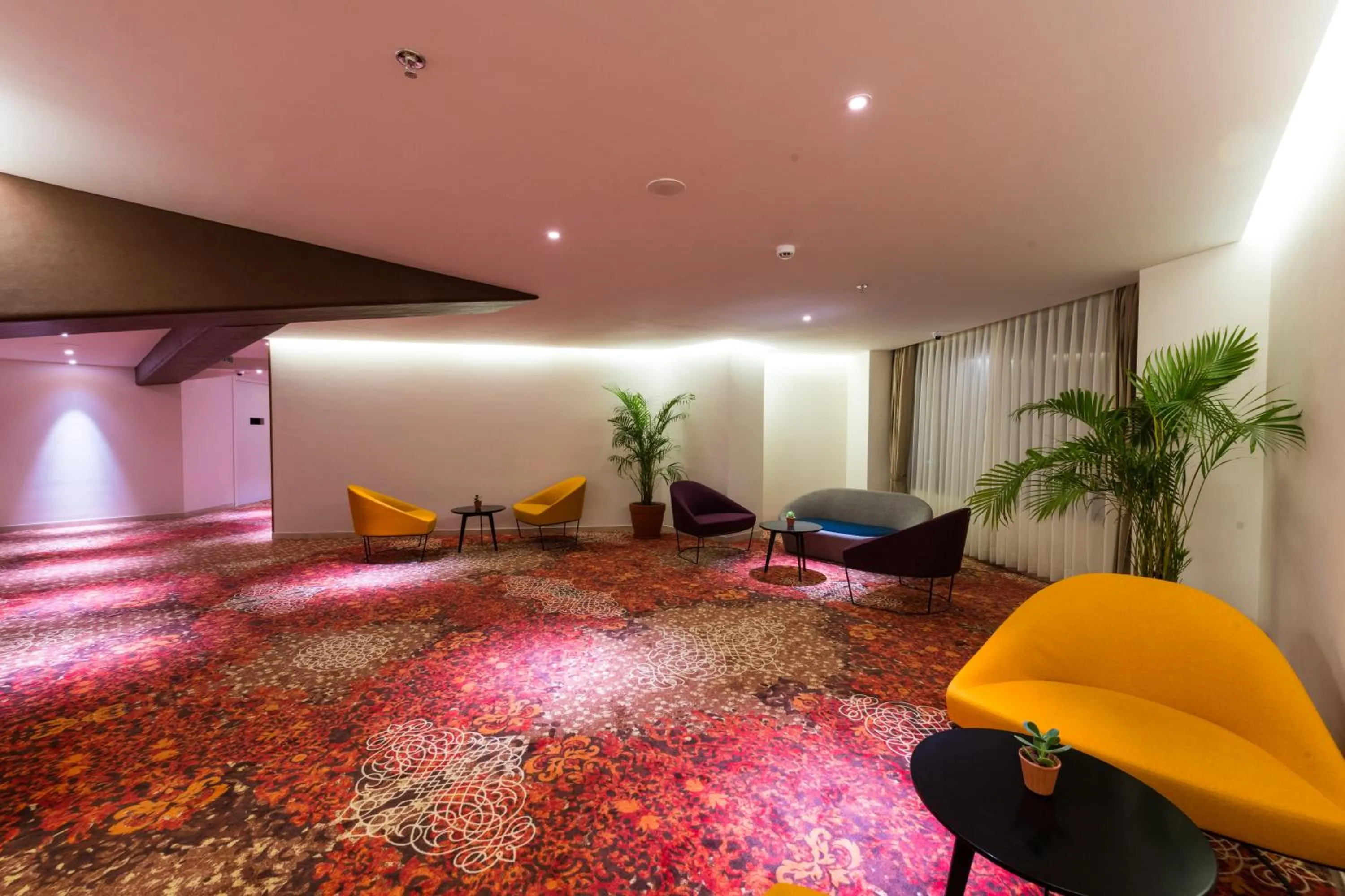 Lounge or bar in The Fern Residency, Jamnagar, Series by Marriott