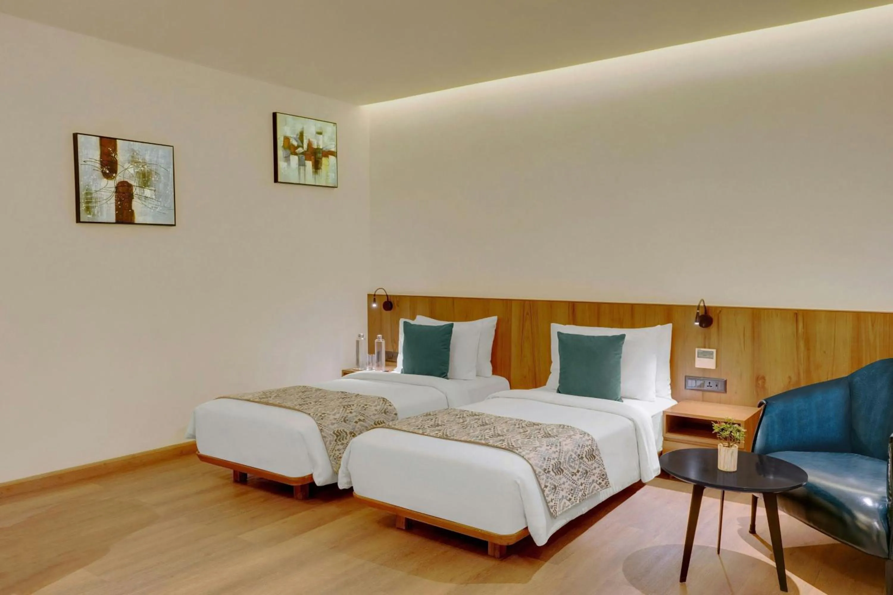 Photo of the whole room, Bed in The Fern Residency, Jamnagar, Series by Marriott