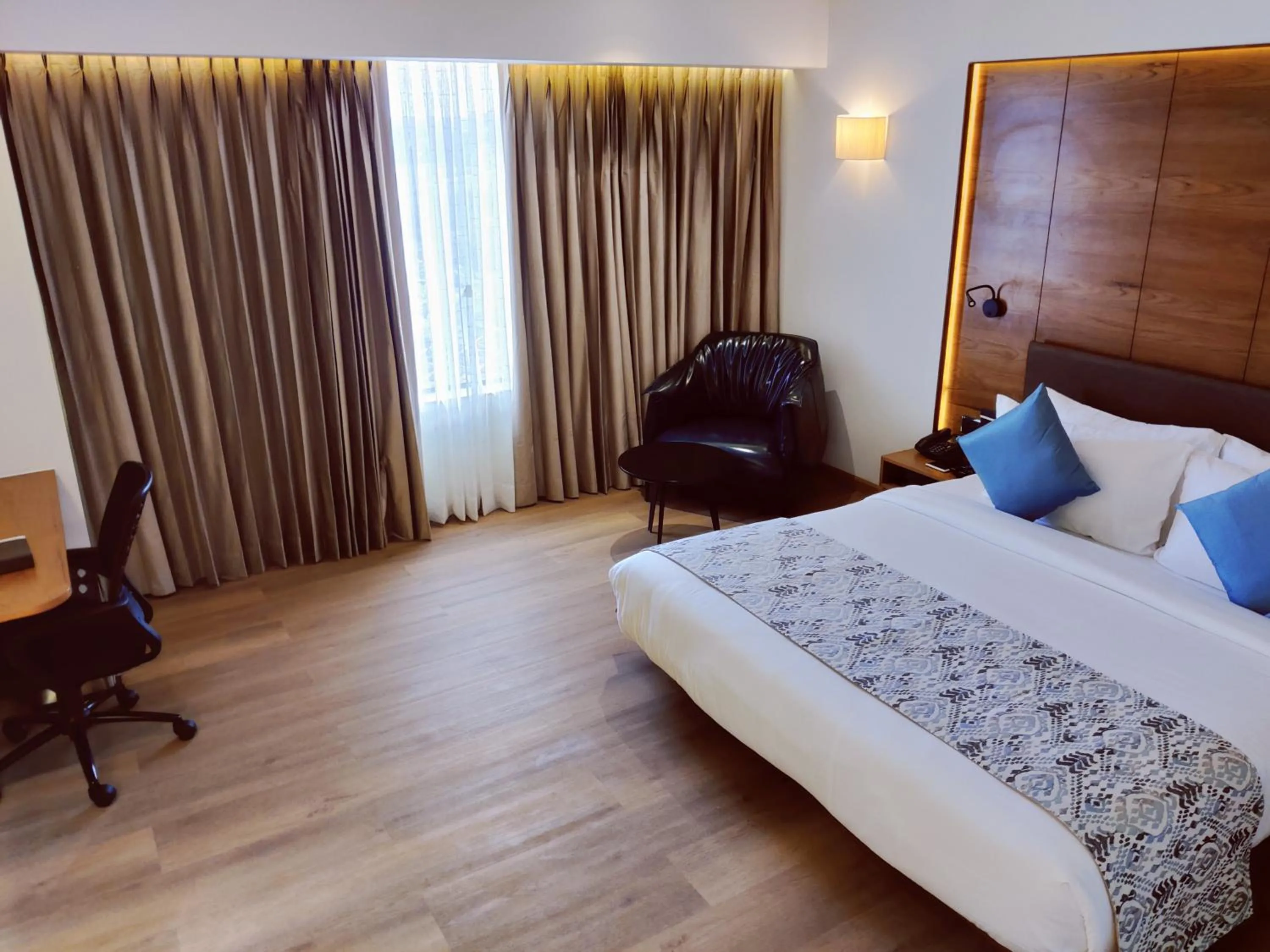 Bed in The Fern Residency, Jamnagar, Series by Marriott
