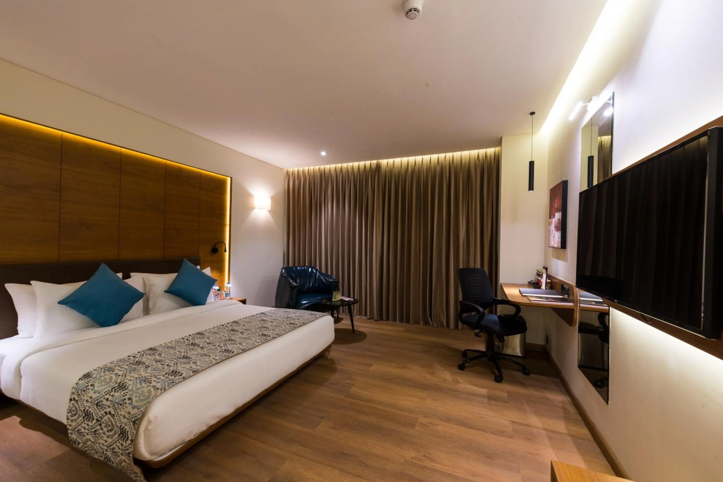 Bed in The Fern Residency, Jamnagar, Series by Marriott