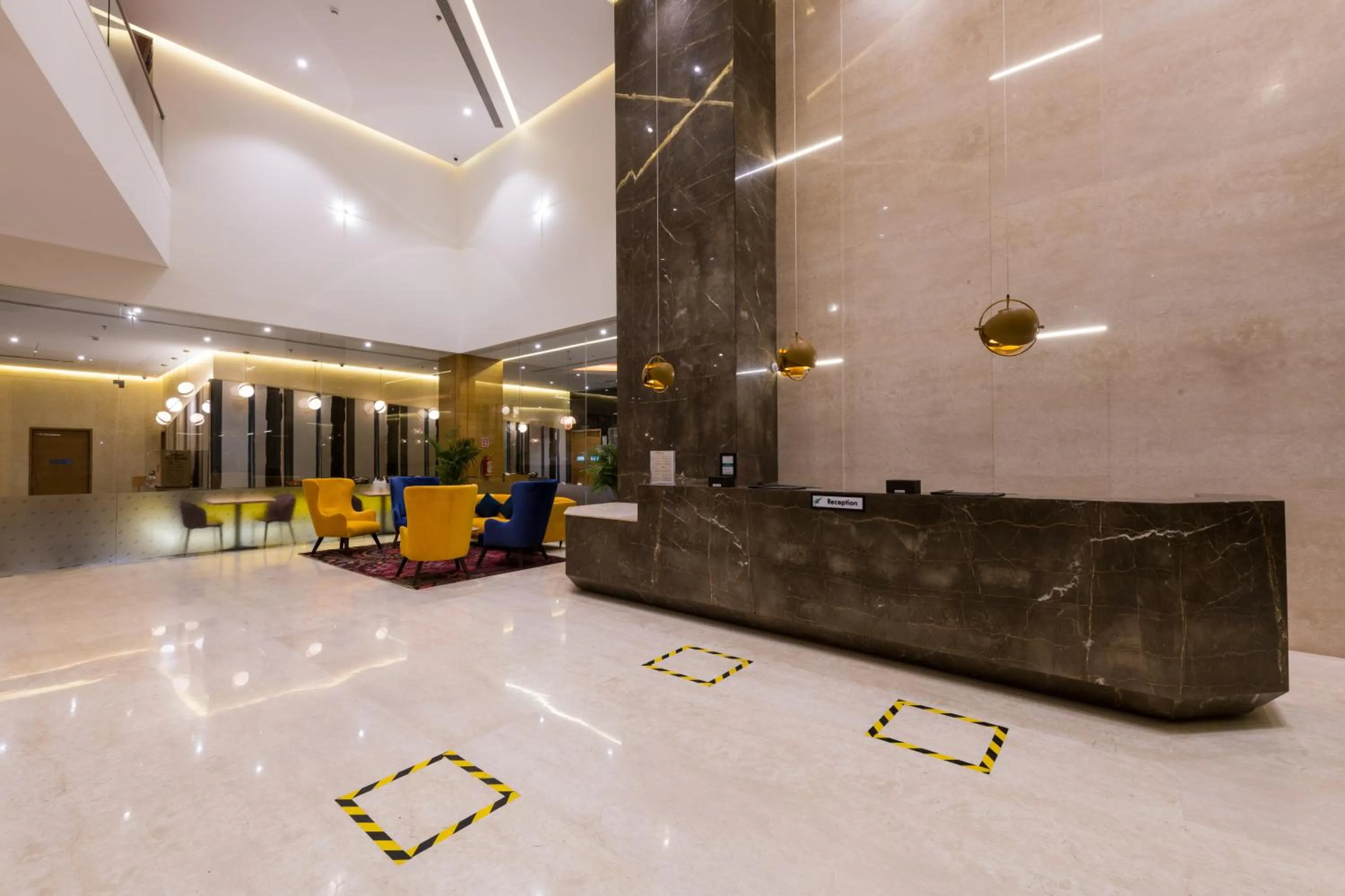 Lobby or reception in The Fern Residency, Jamnagar, Series by Marriott