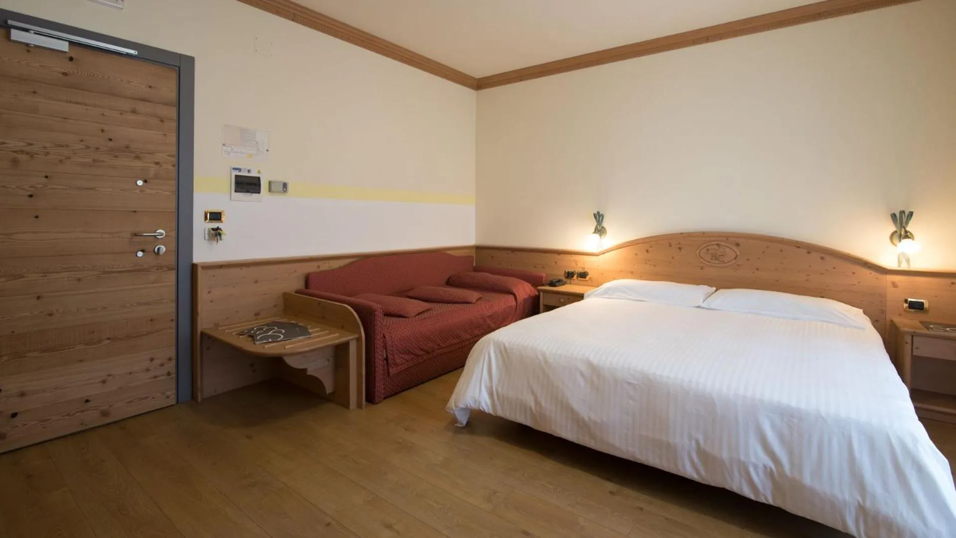 Bed in Hotel Colfosco