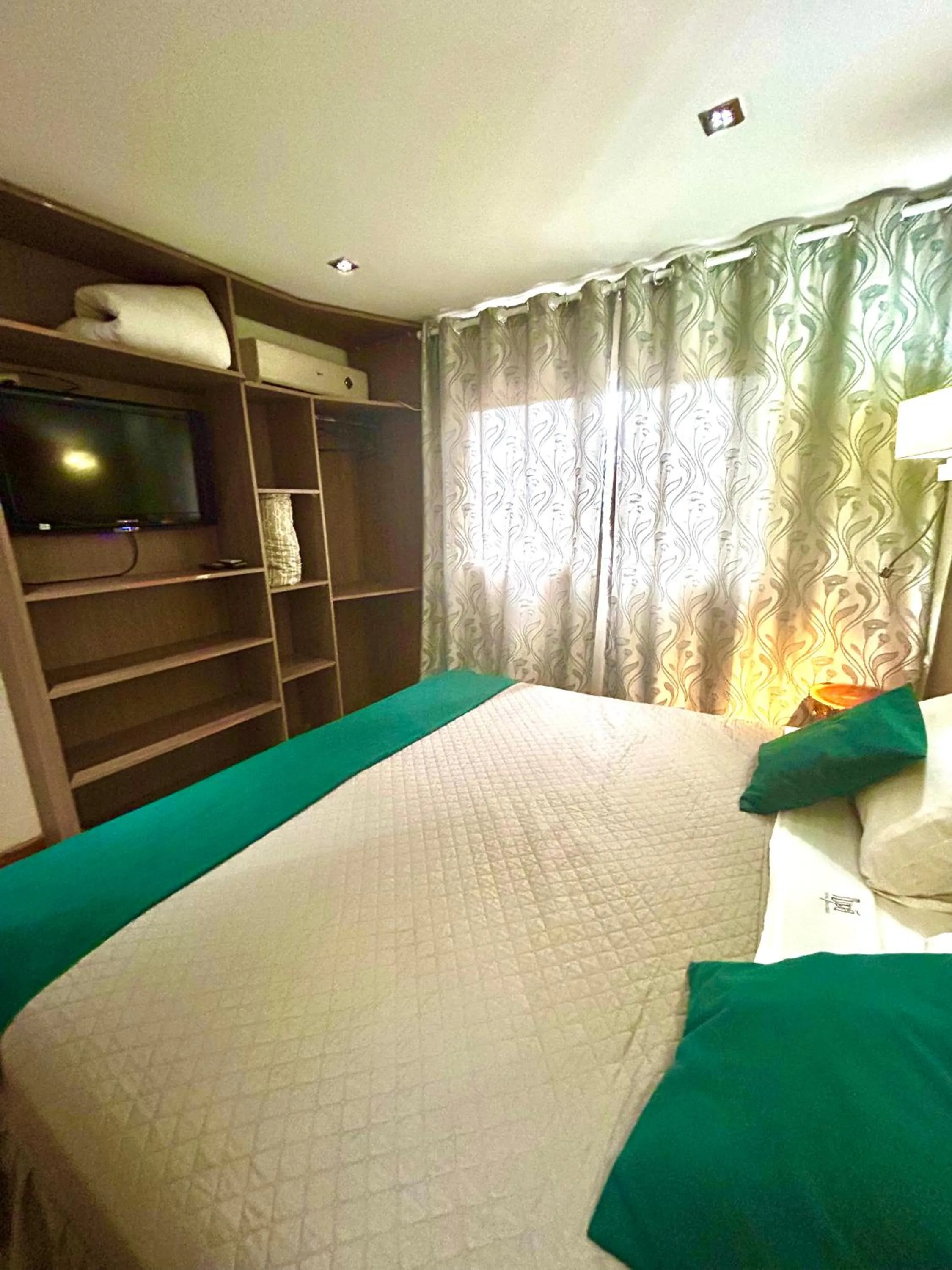 Bed in Tupa Hotel Iguazu