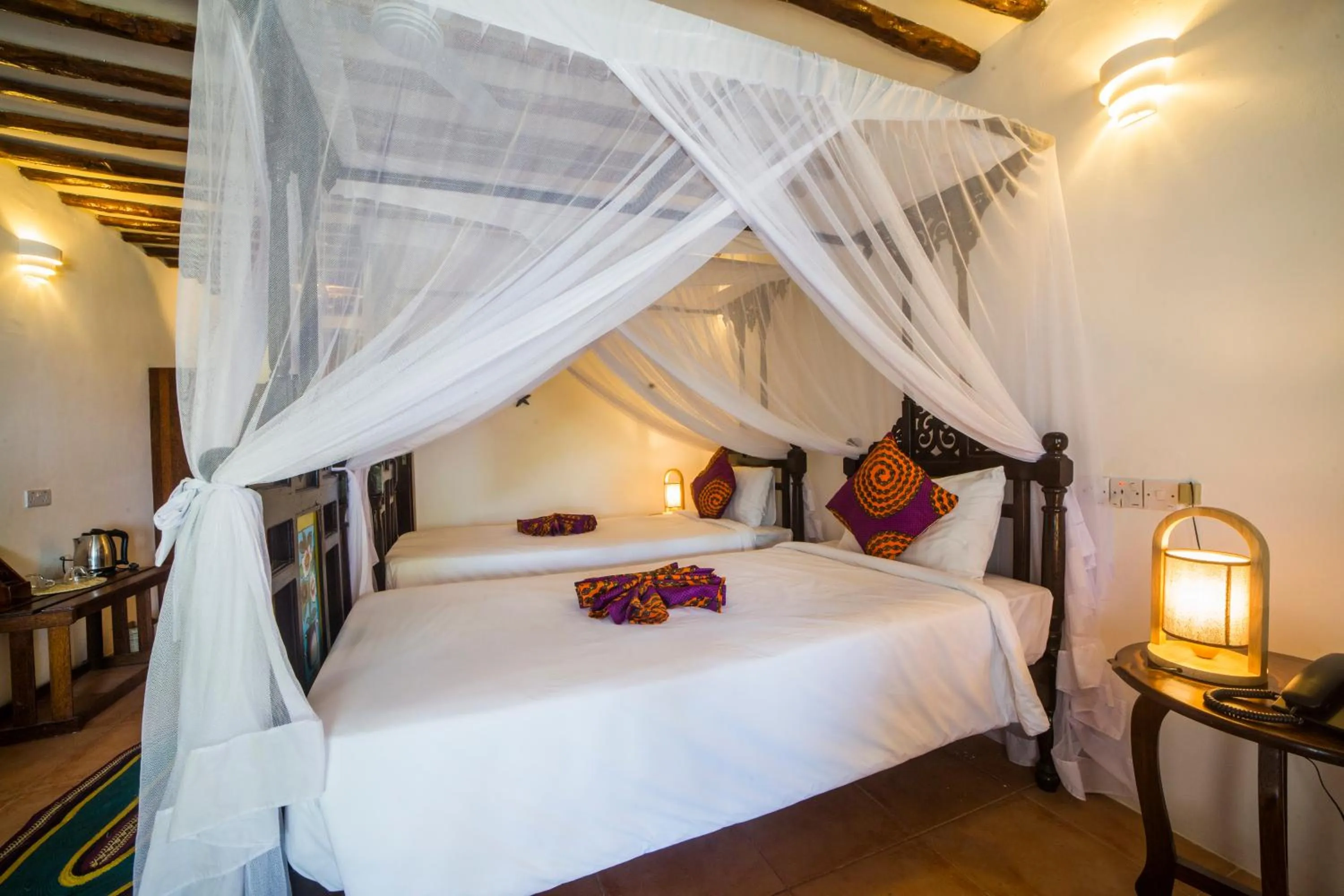 Bed in Antonio Beach Tree House Hotel & Spa