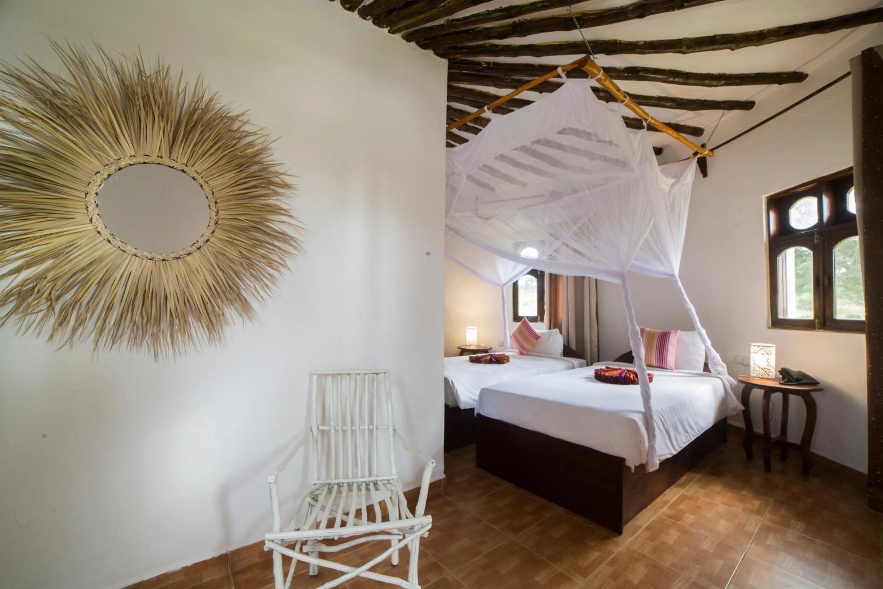 Bed in Antonio Beach Tree House Hotel & Spa