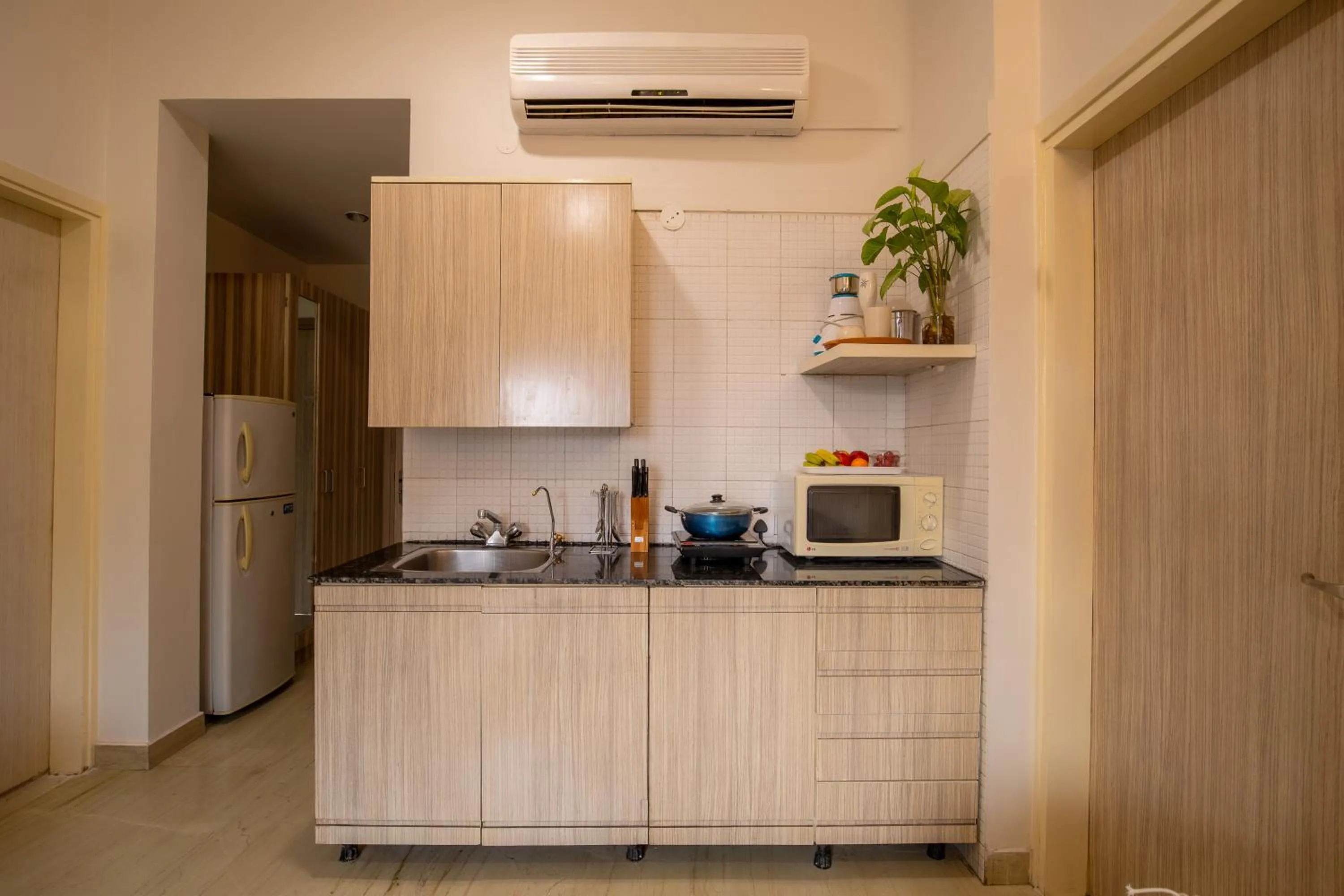 Kitchen or kitchenette in BedChambers Serviced Apartments, Sector 40