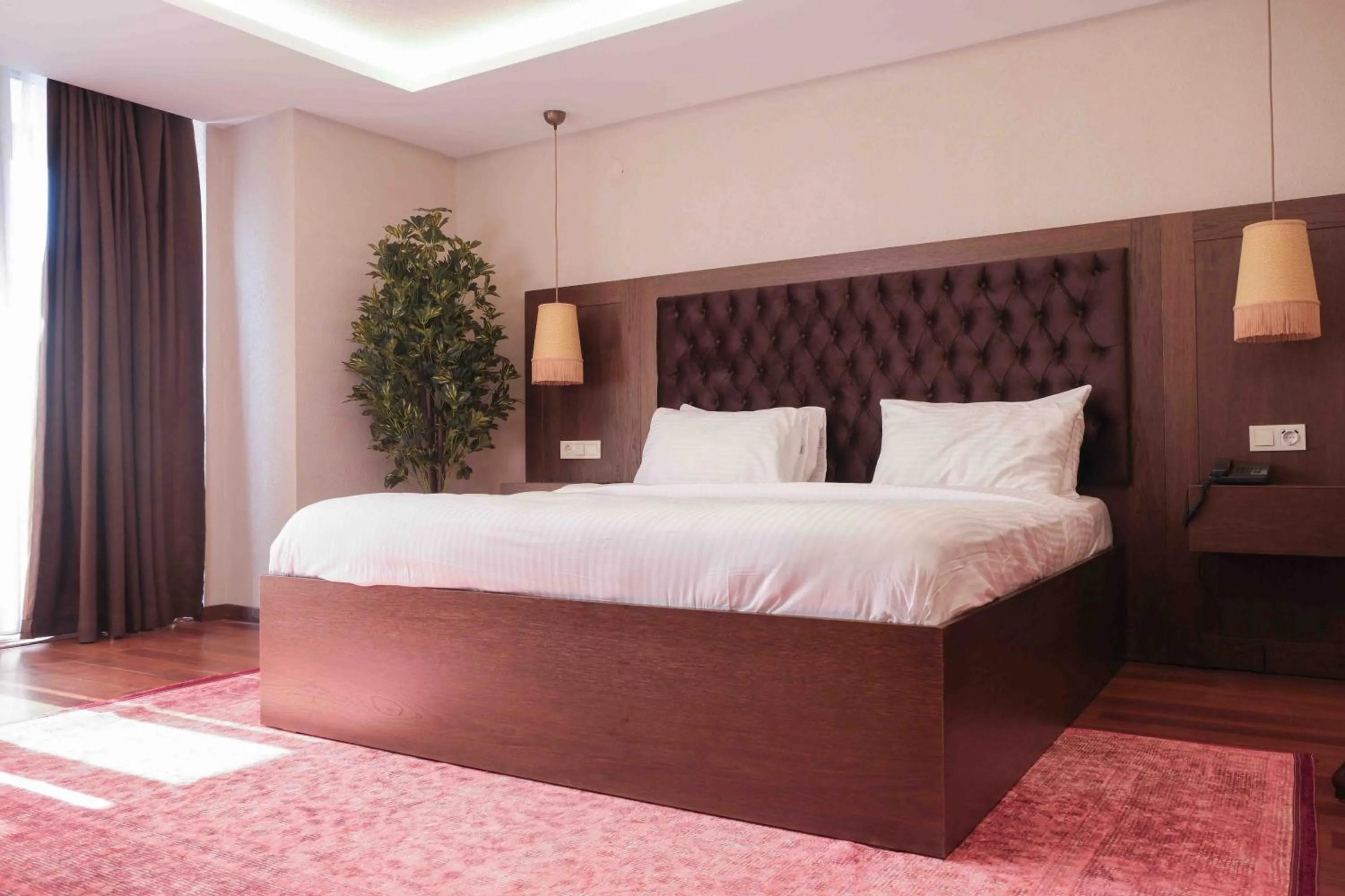 Bed in Phellos Suites Boutique Hotel