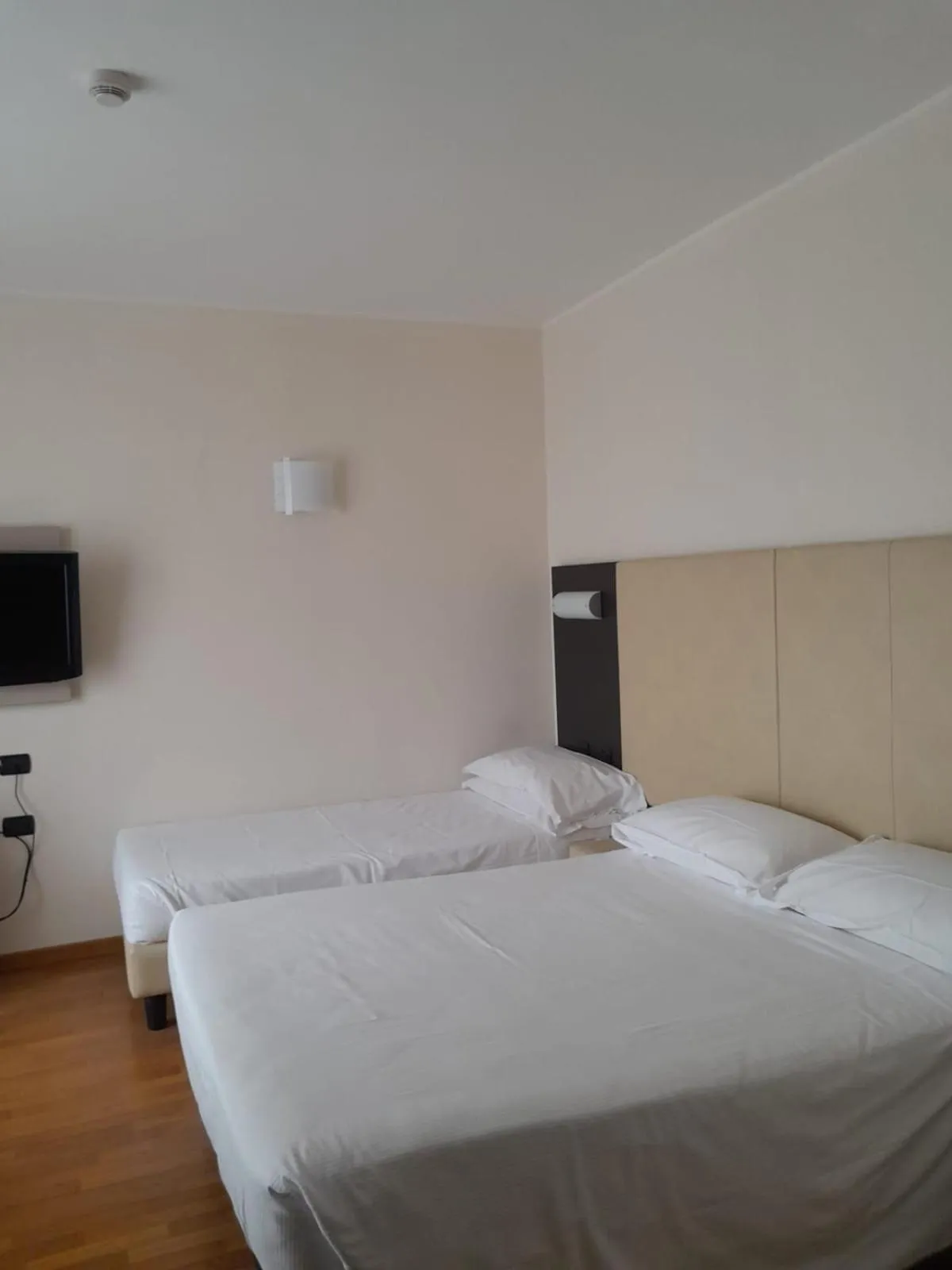 Bed in Elysium Hotel Raya