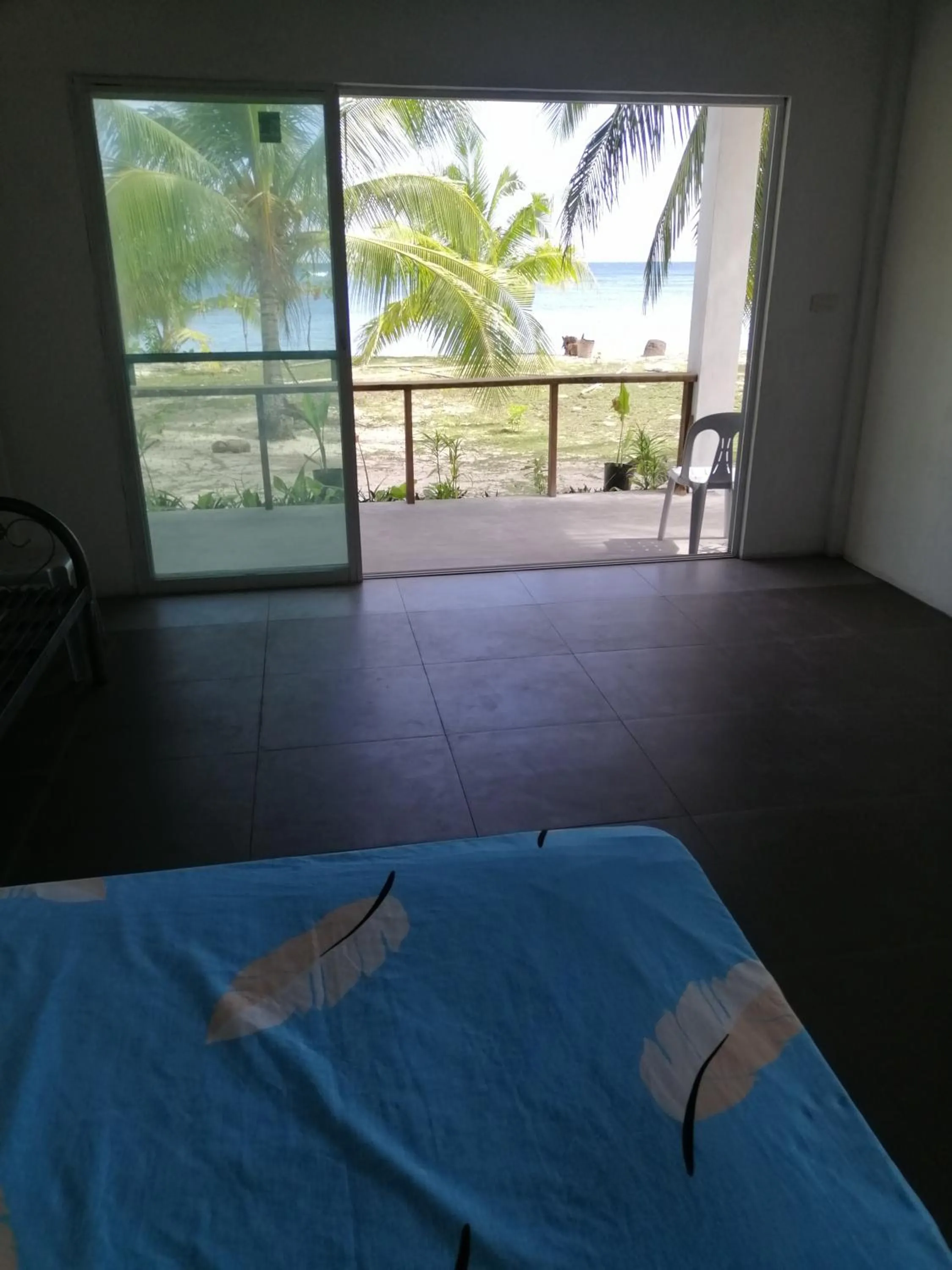 Bed in Anajawan Island Beachfront Resort