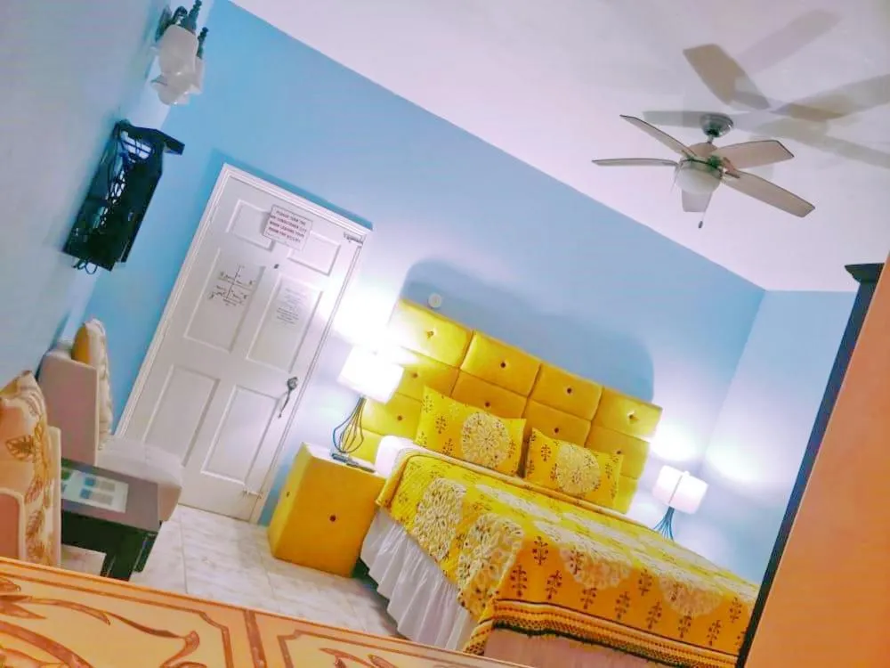 Bed in Dela de-Rose Guest House Negril Jamaica