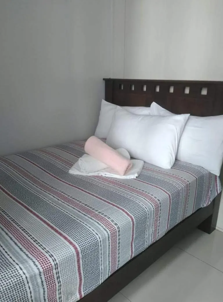 Bed in LIAM's Staycation