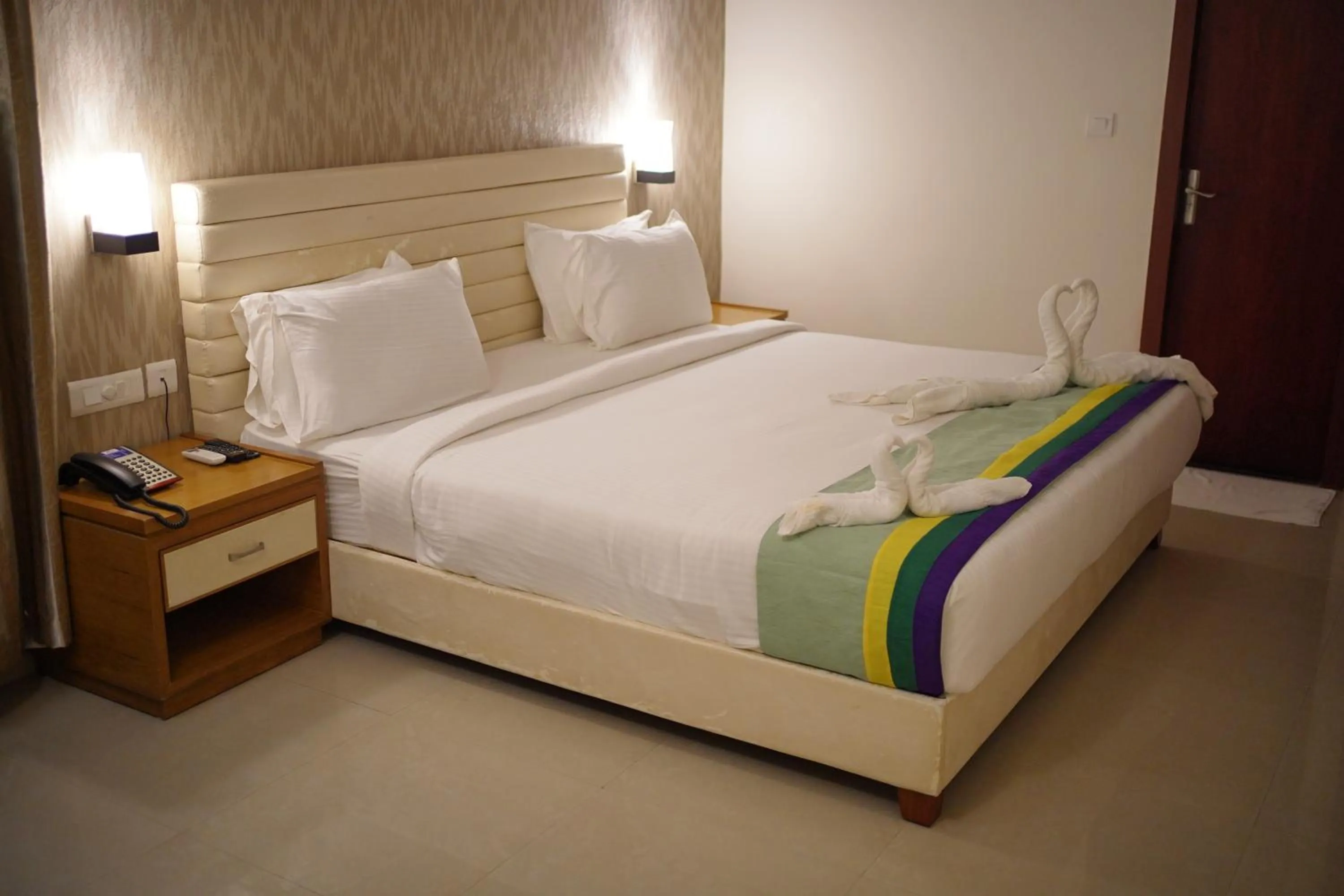 Bed in RR INN Group Of Hotels