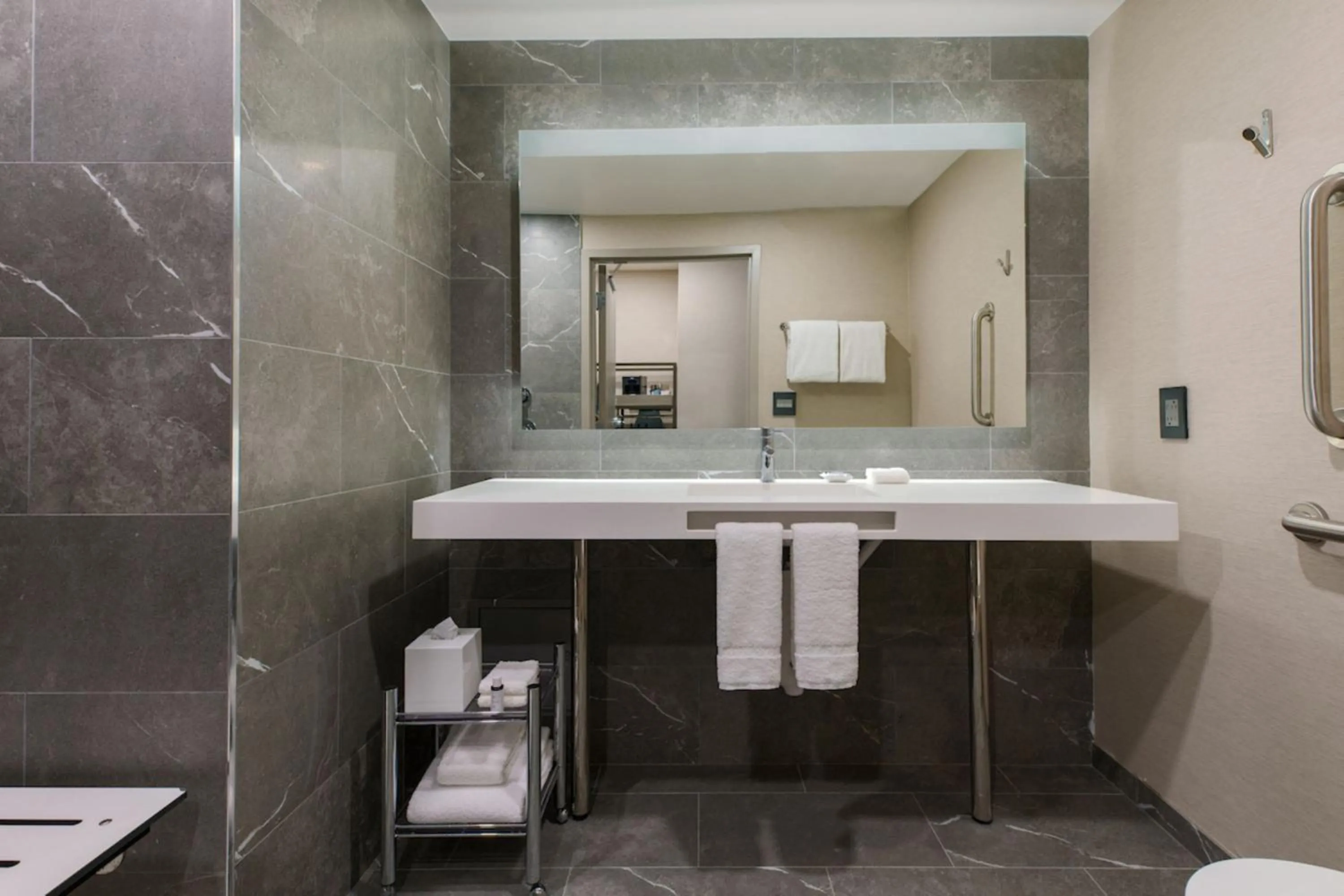 Bathroom in AC Hotel by Marriott Tallahassee Universities at the Capitol