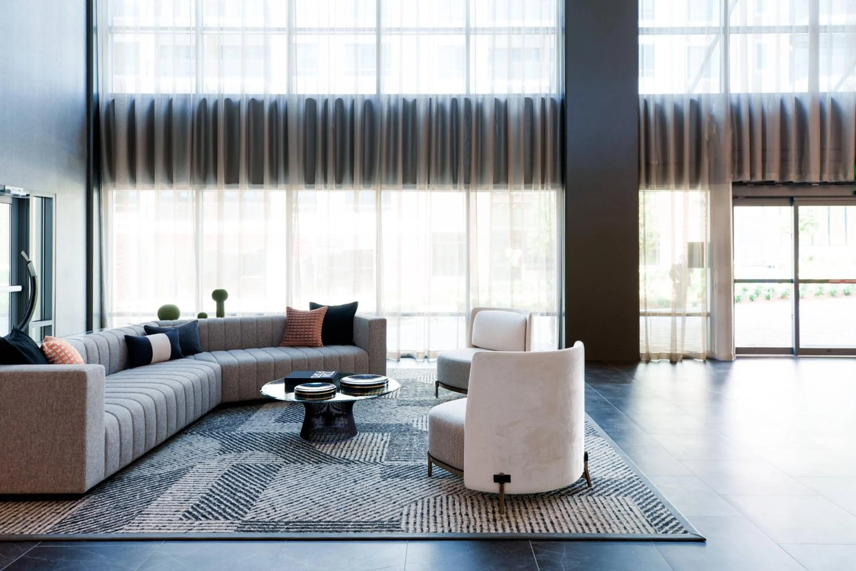 Lobby or reception in AC Hotel by Marriott Tallahassee Universities at the Capitol