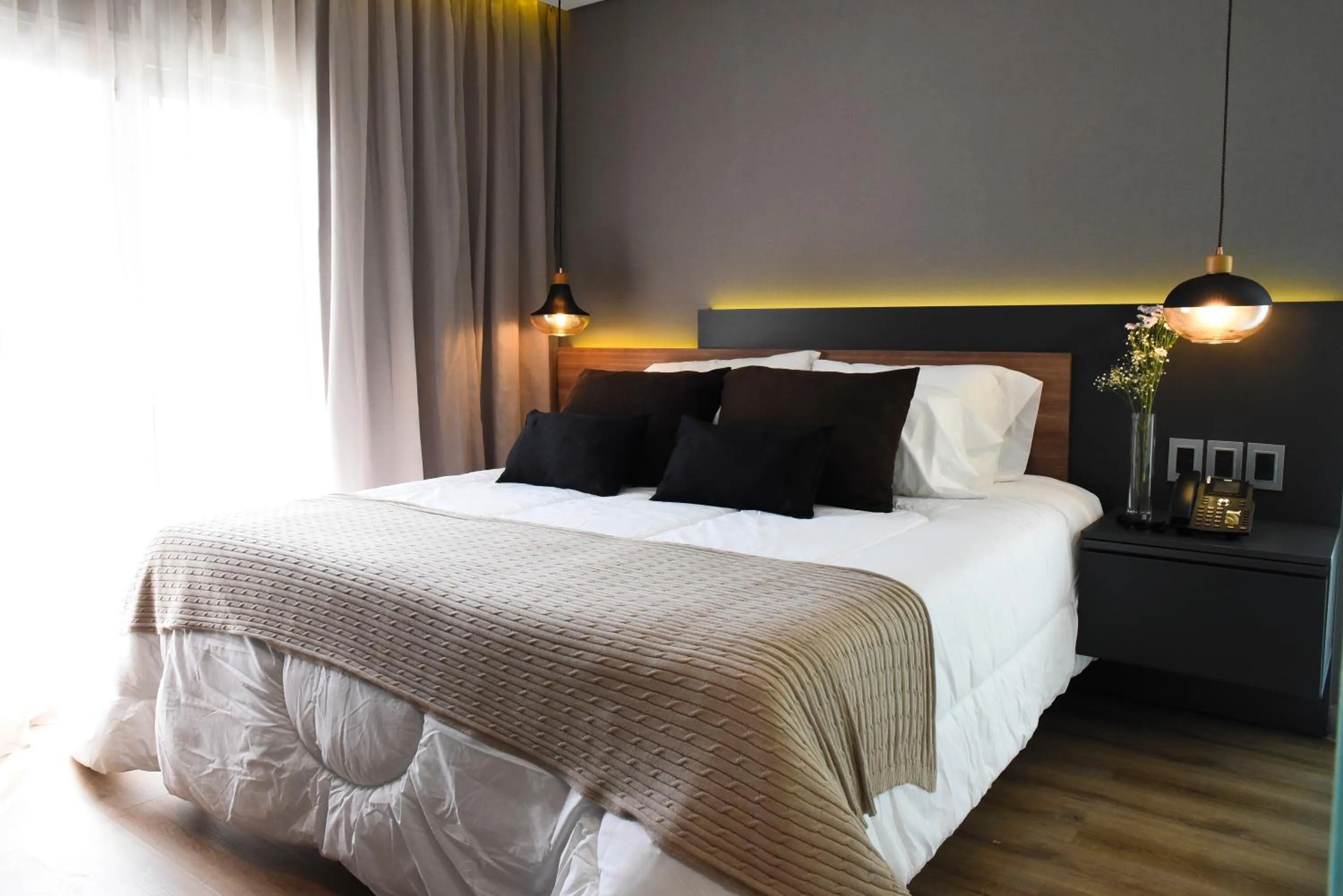 Bed in Hotel Soho Suites