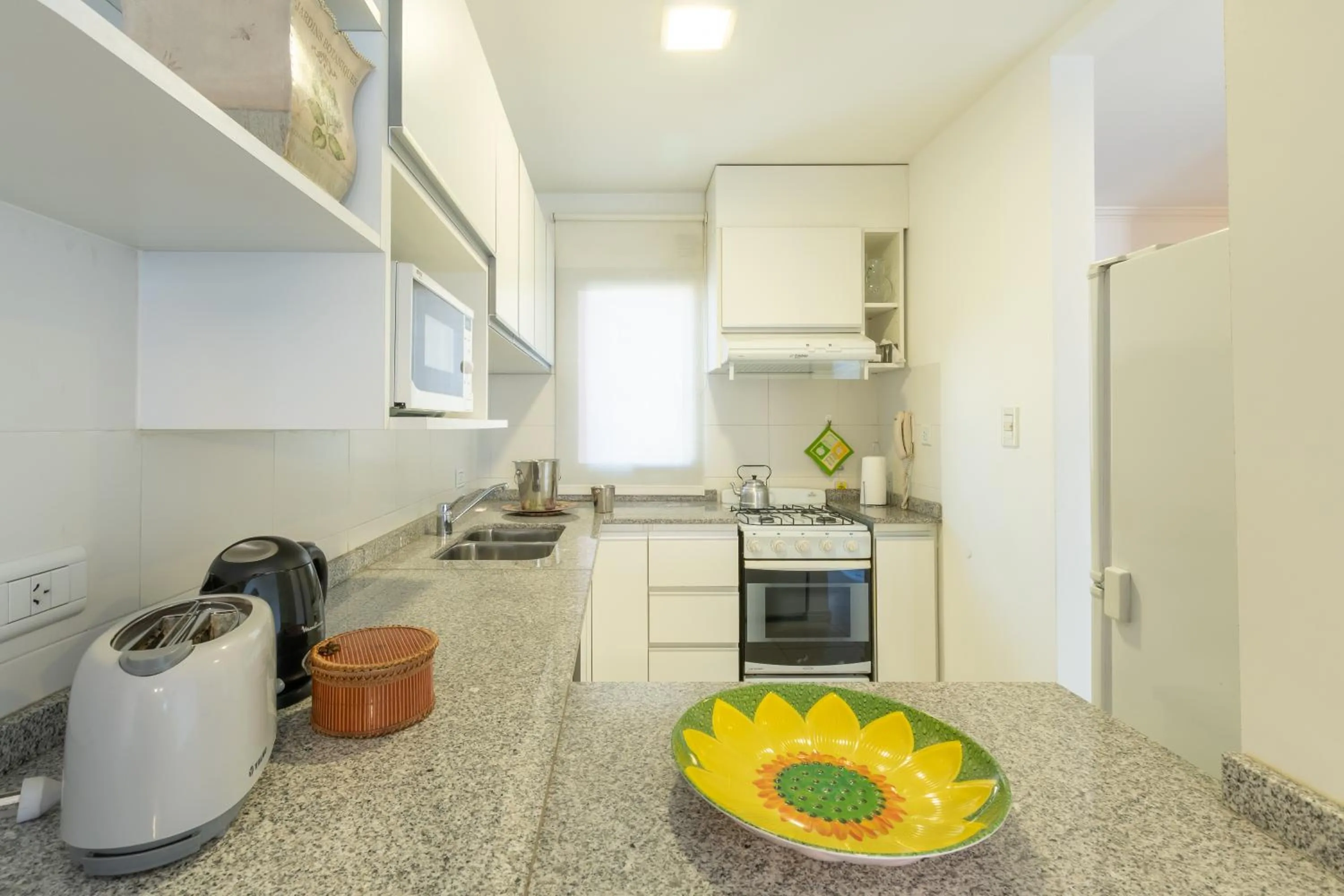 Kitchen or kitchenette in AT Suites