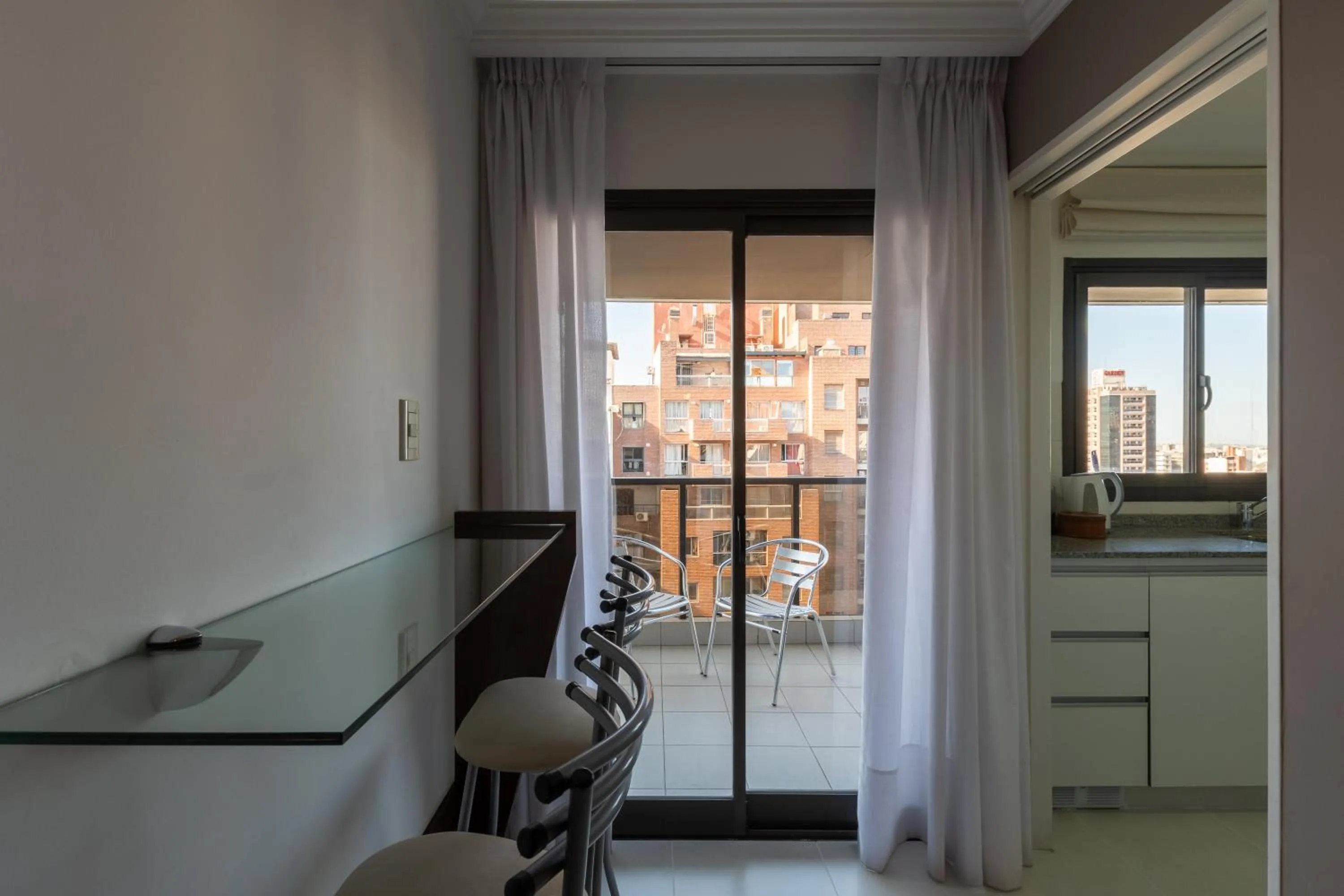 Kitchen or kitchenette in AT Suites