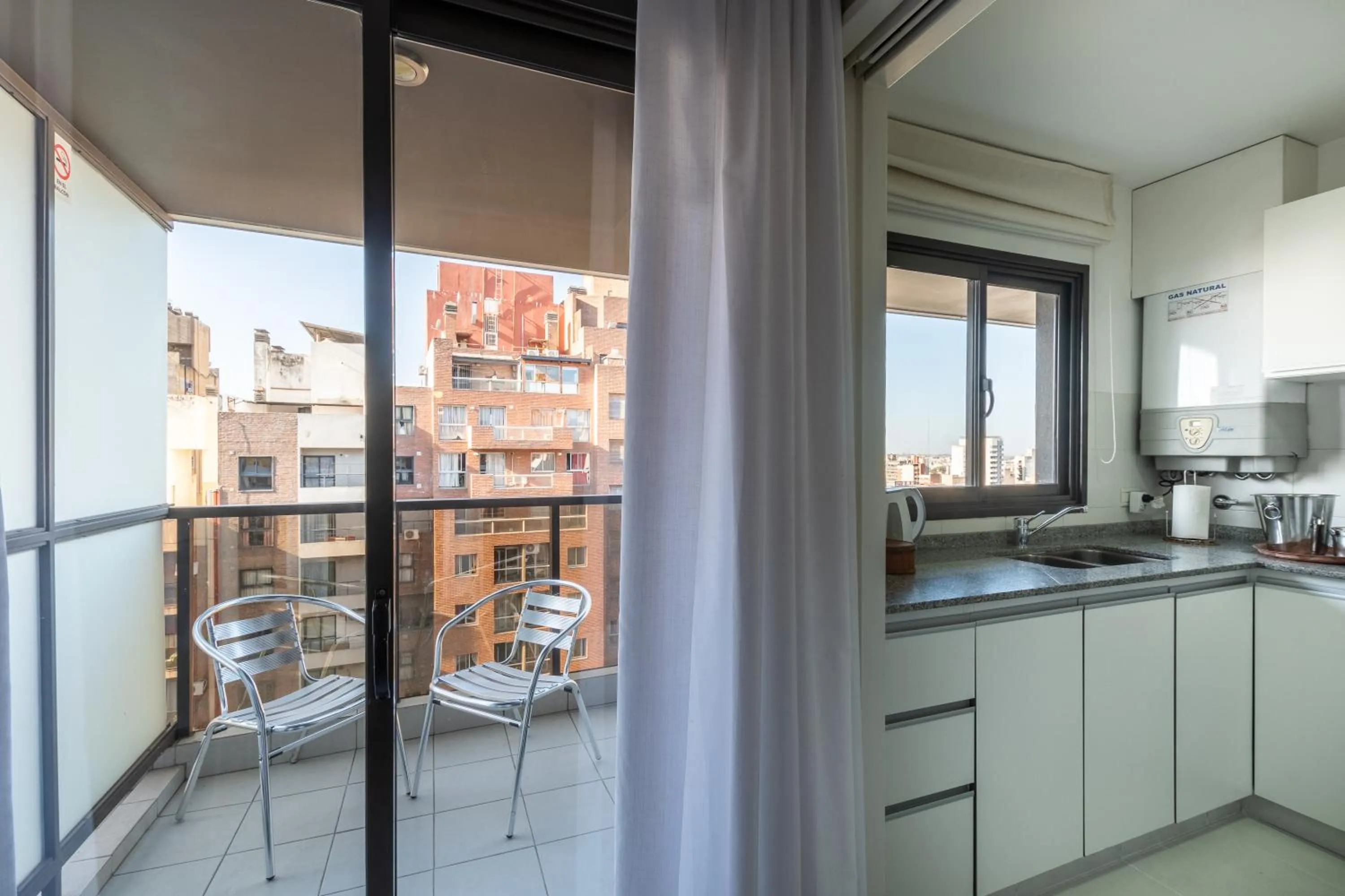 Kitchen or kitchenette in AT Suites