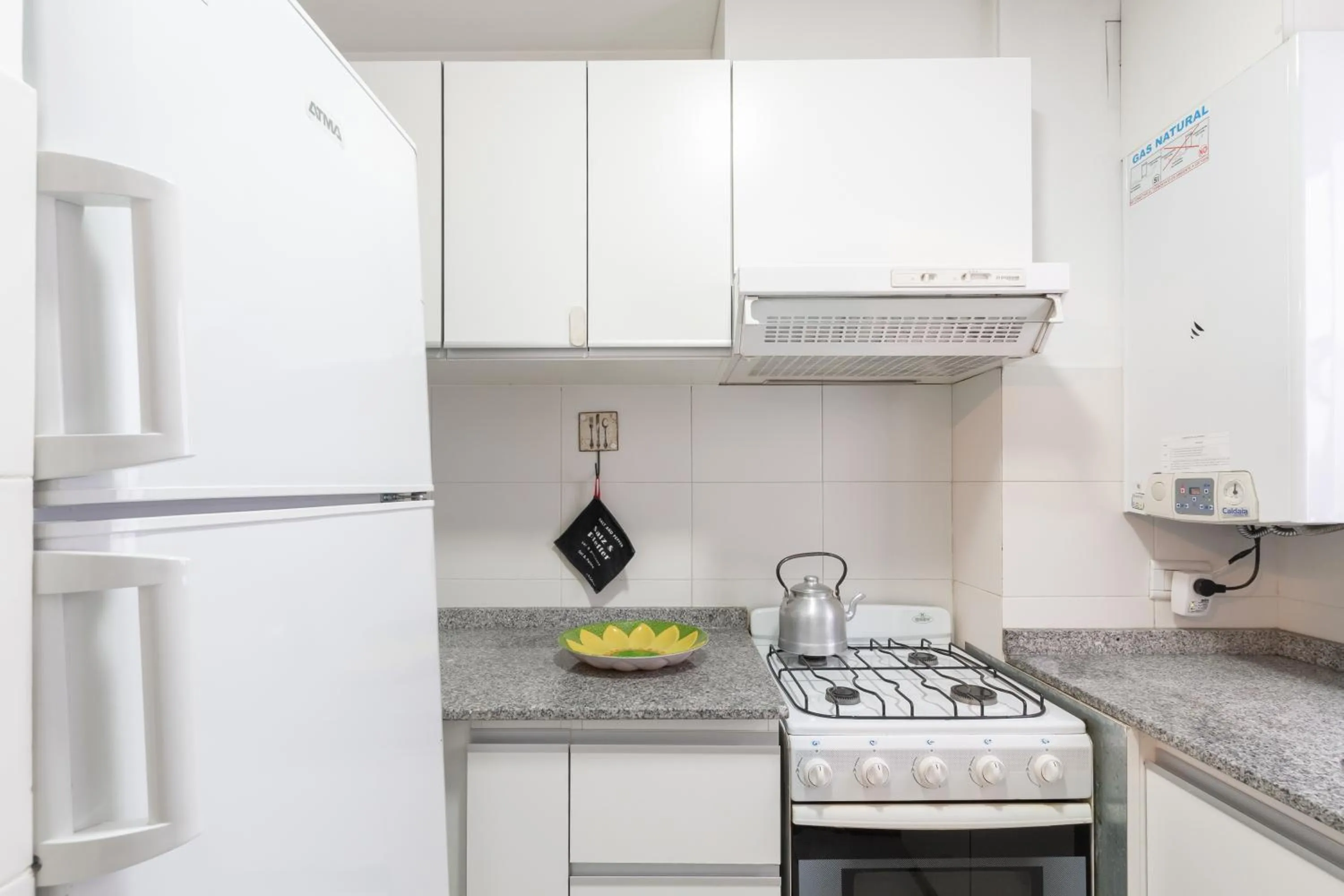 Kitchen or kitchenette in AT Suites