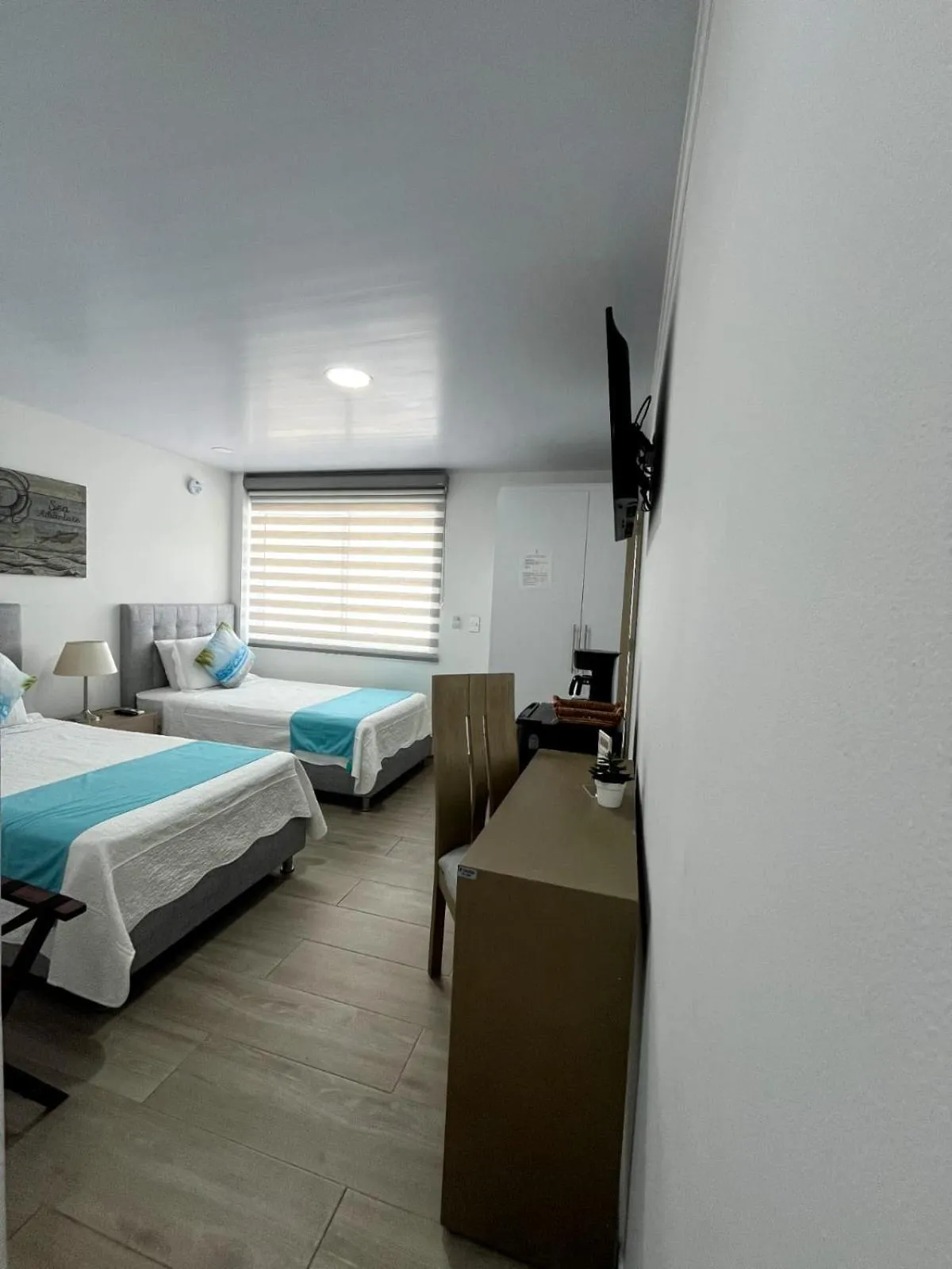 Bed in Hotel Mar de Corales By CAJASAI