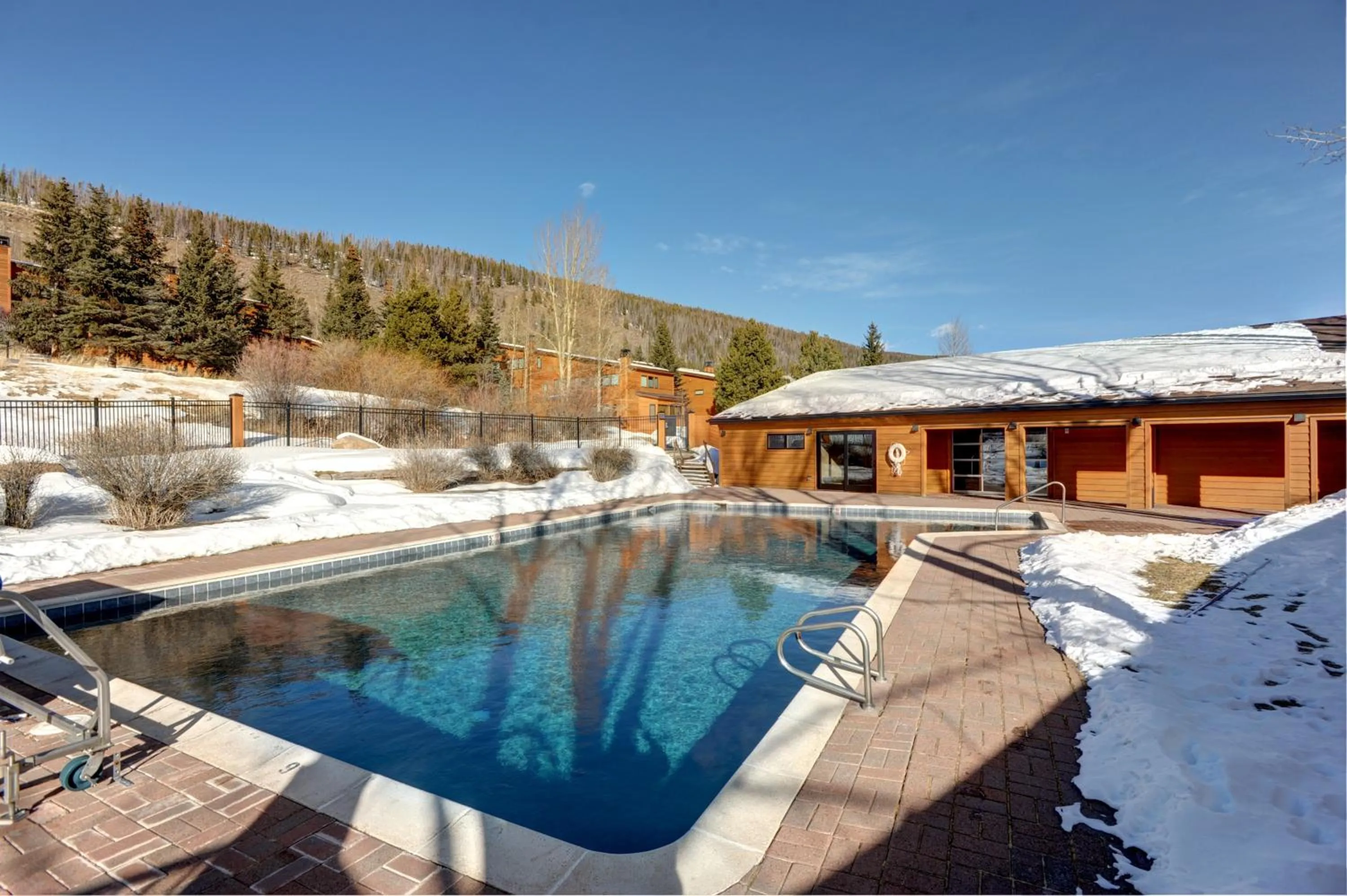 Swimming pool in Aspen Ridge Condominiums by Vail Resorts