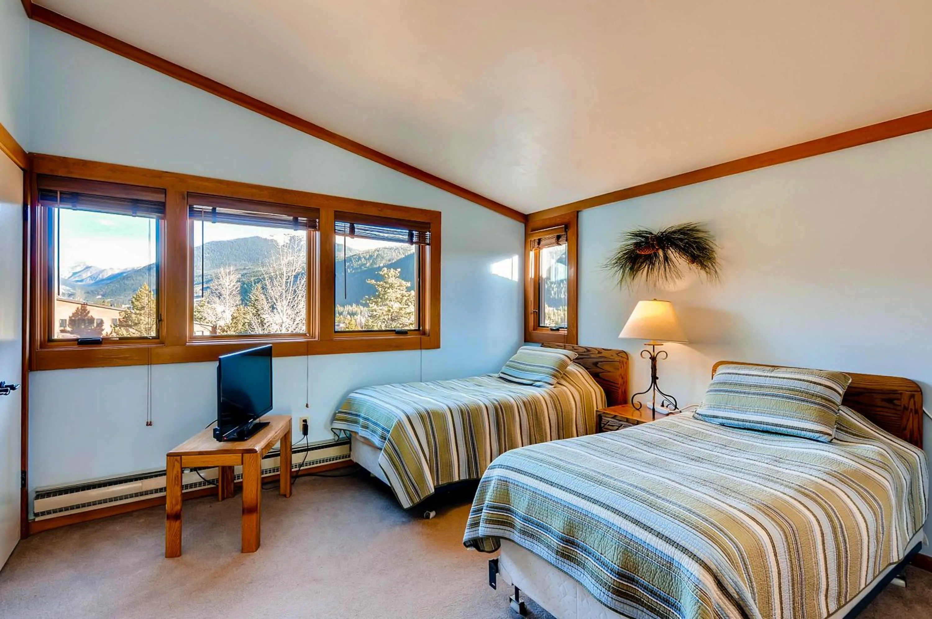 Bed in Aspen Ridge Condominiums by Vail Resorts