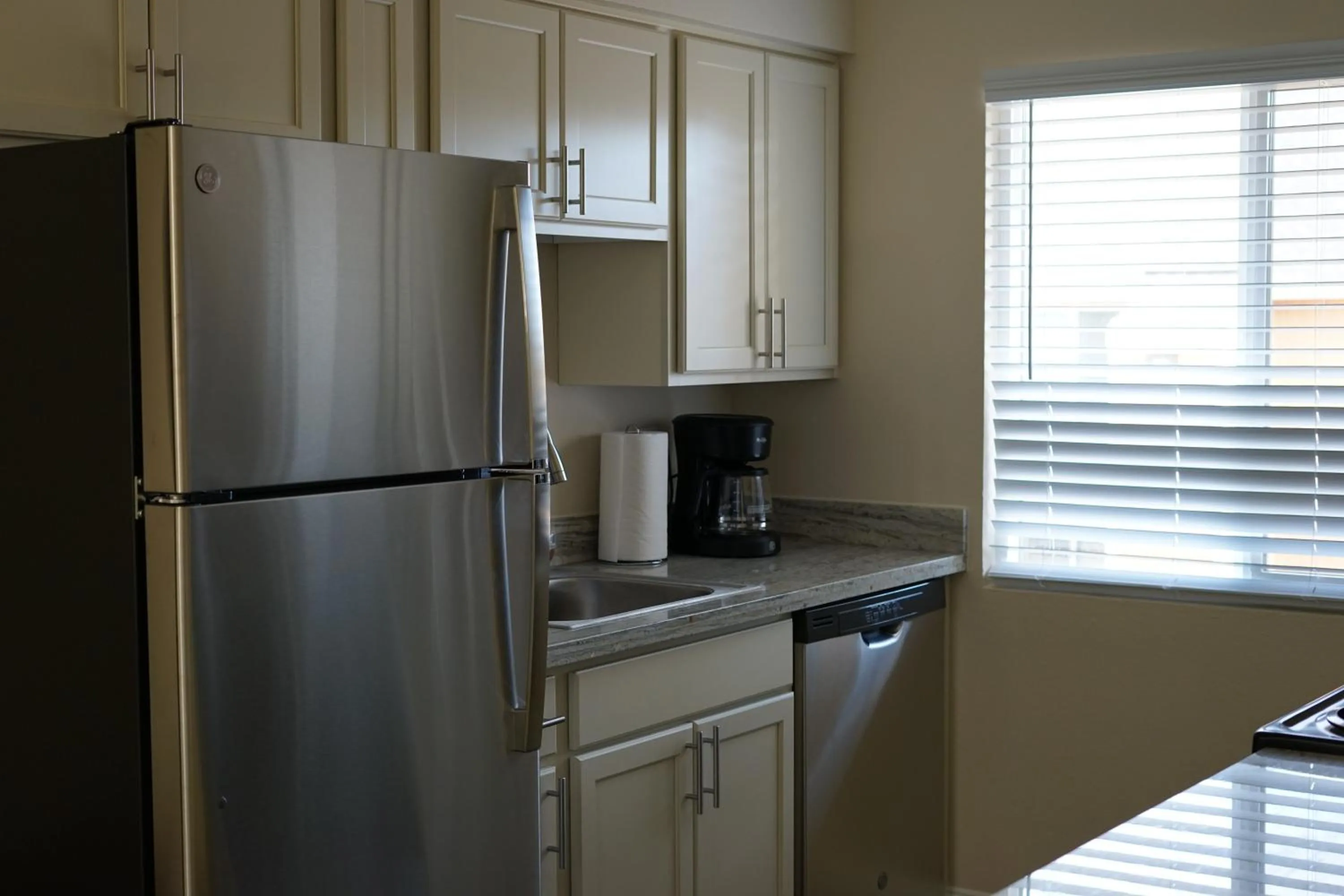 Kitchen or kitchenette in Sleepover 1BD 1BA Oklahoma City Apartments