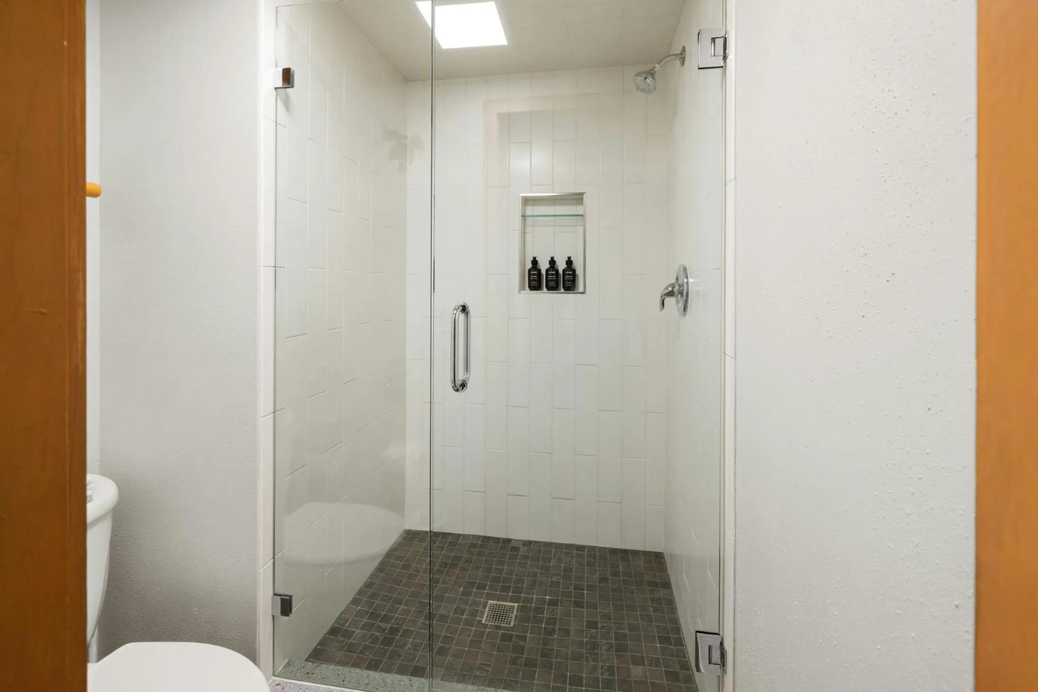 Shower in Evergreen Condominiums by Vail Resorts