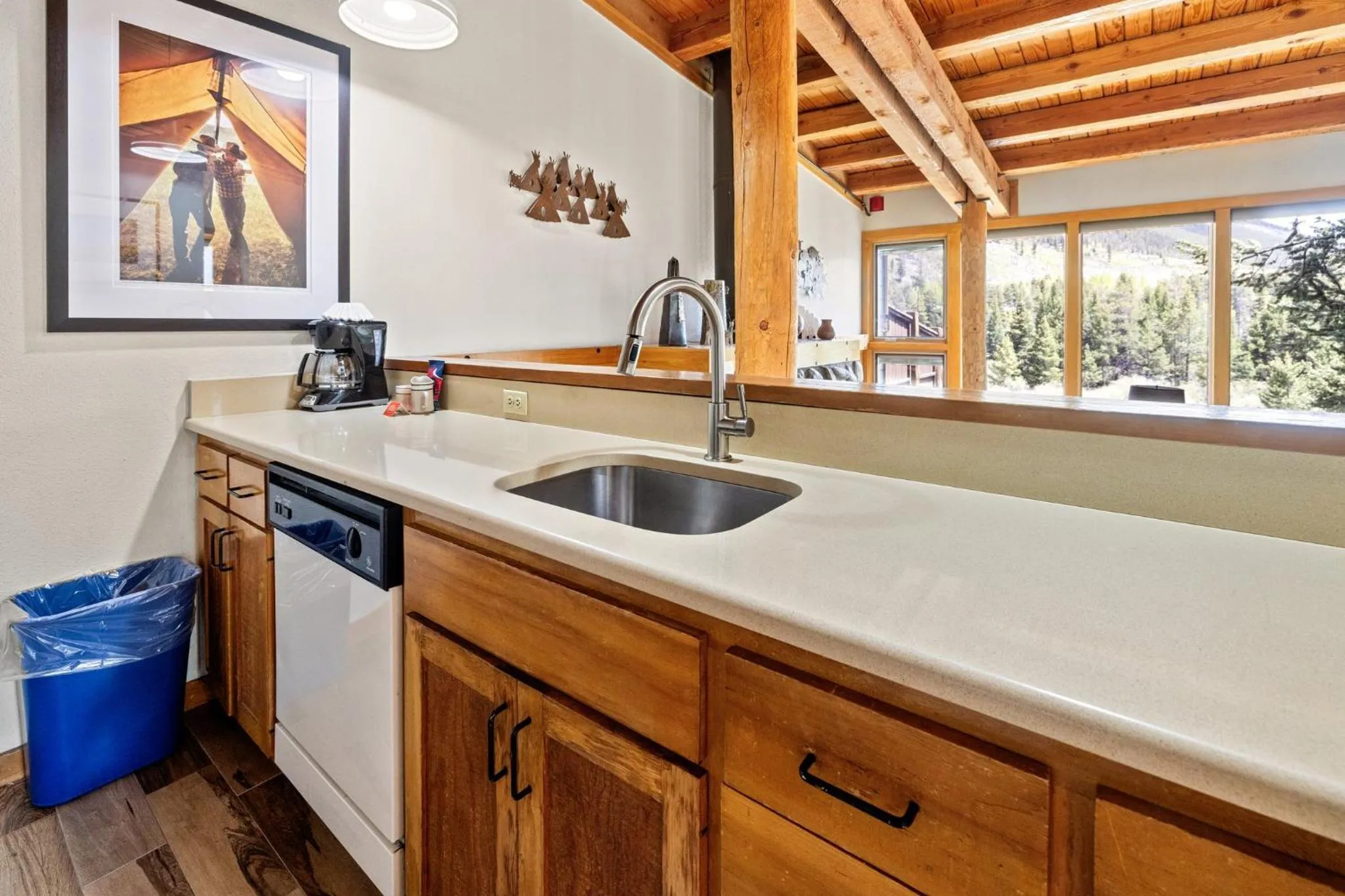 Communal kitchen in Evergreen Condominiums by Vail Resorts