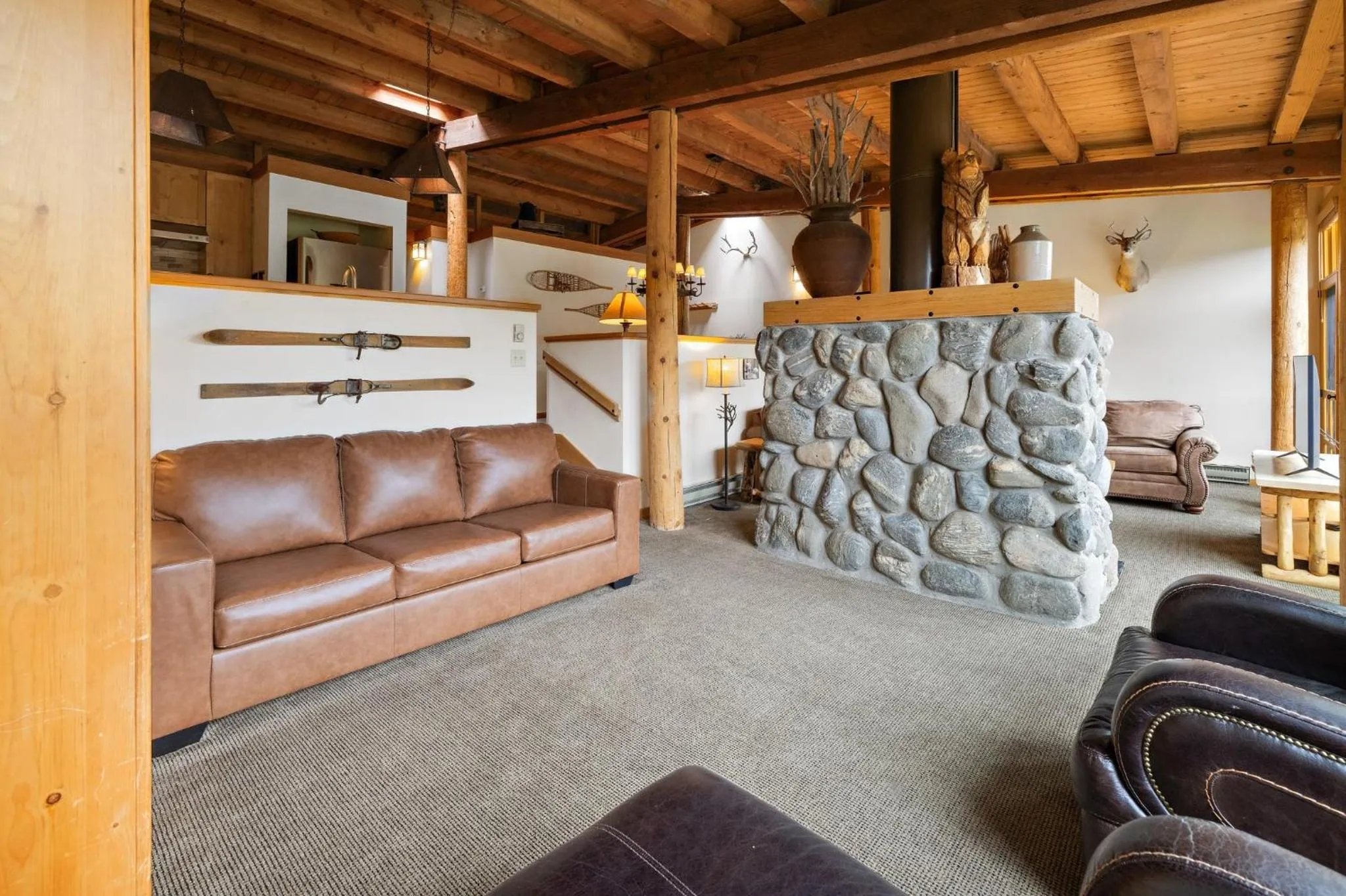 Living room in Evergreen Condominiums by Vail Resorts