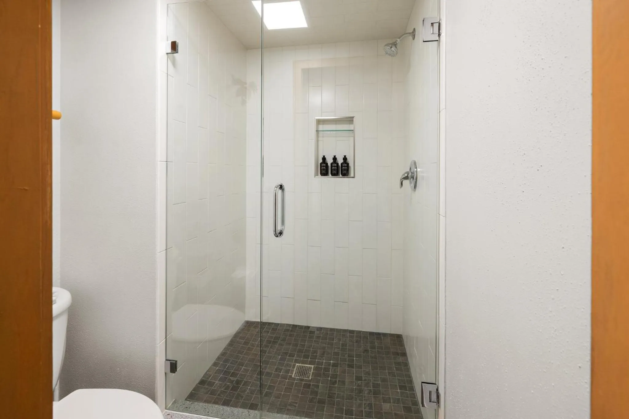 Shower in Evergreen Condominiums by Vail Resorts