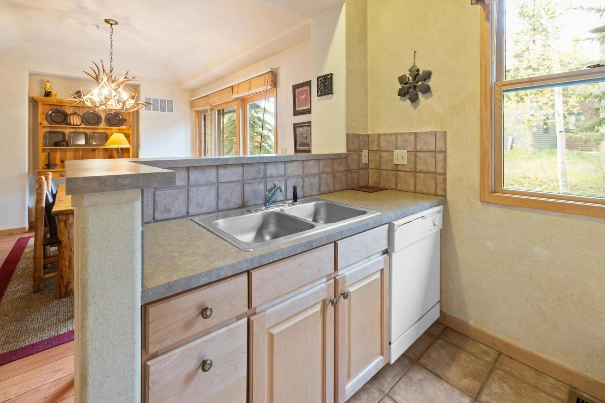 Communal kitchen in Forest Condominiums by Vail Resorts