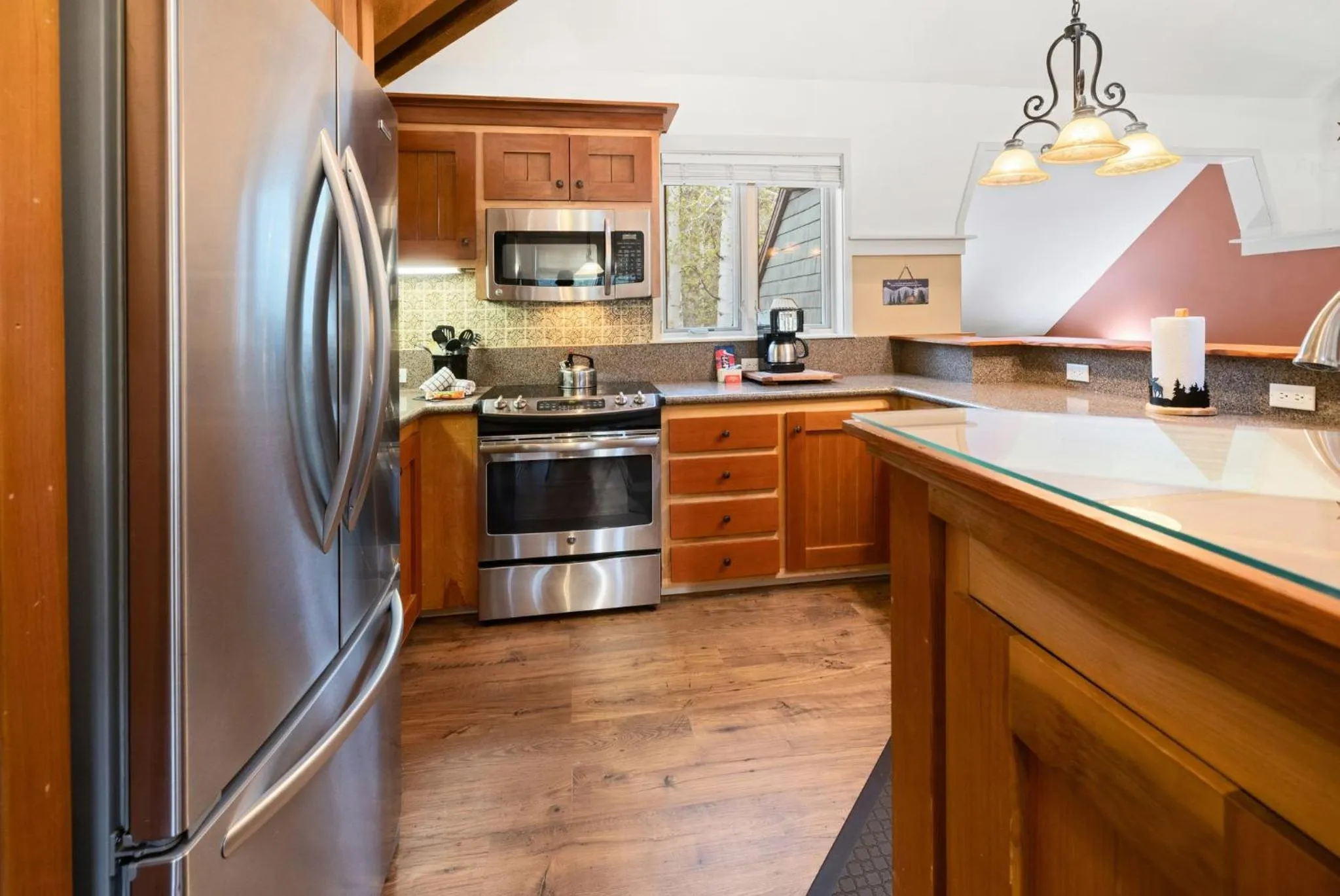 Communal kitchen in Forest Condominiums by Vail Resorts