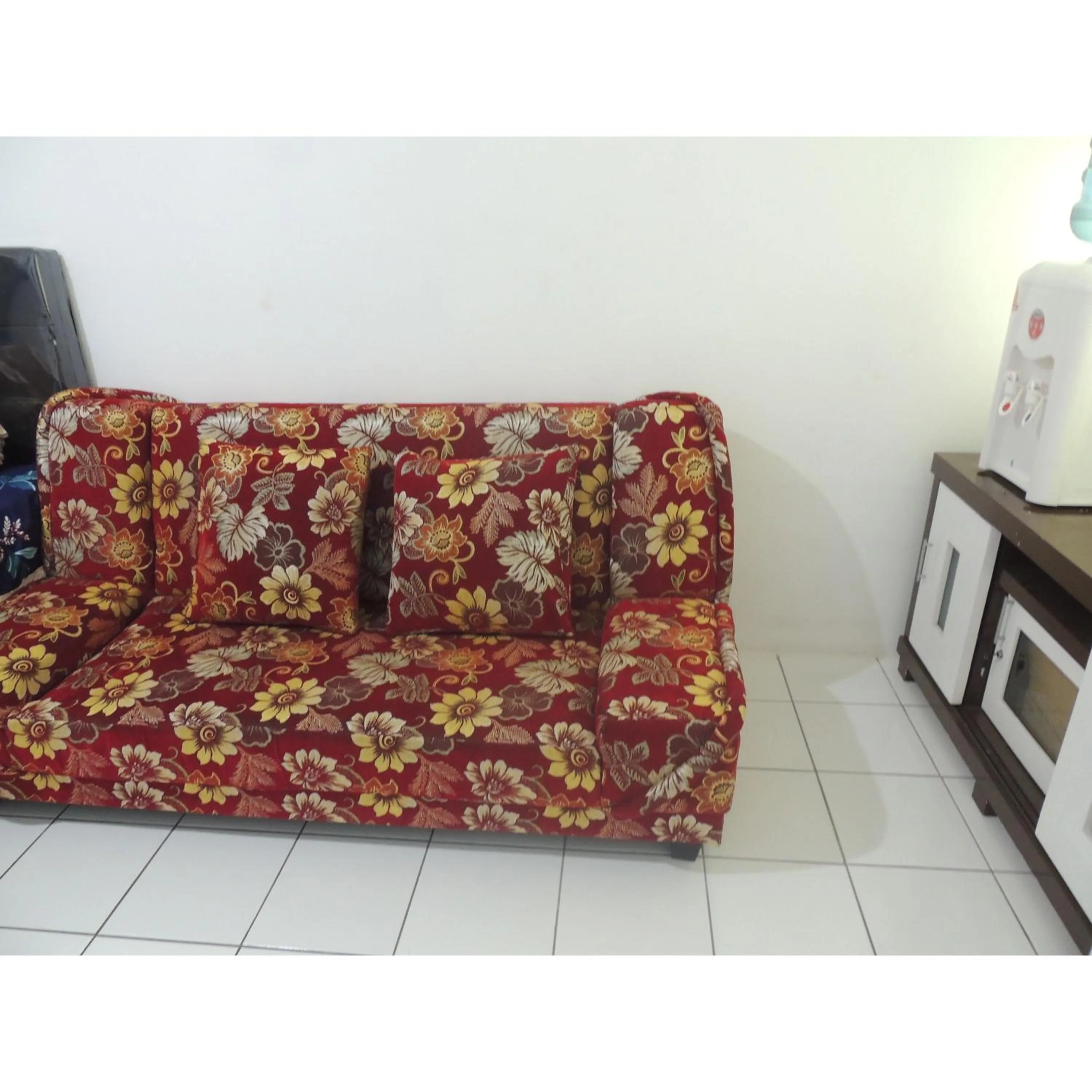 Seating area in Reva Room on Gunung Putri Square Apartment