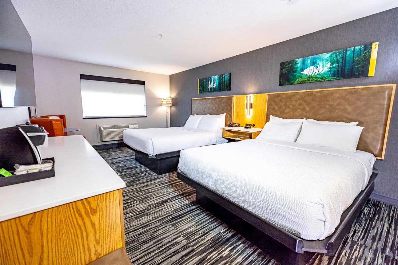 Bed in Creekside Hotel & Suites