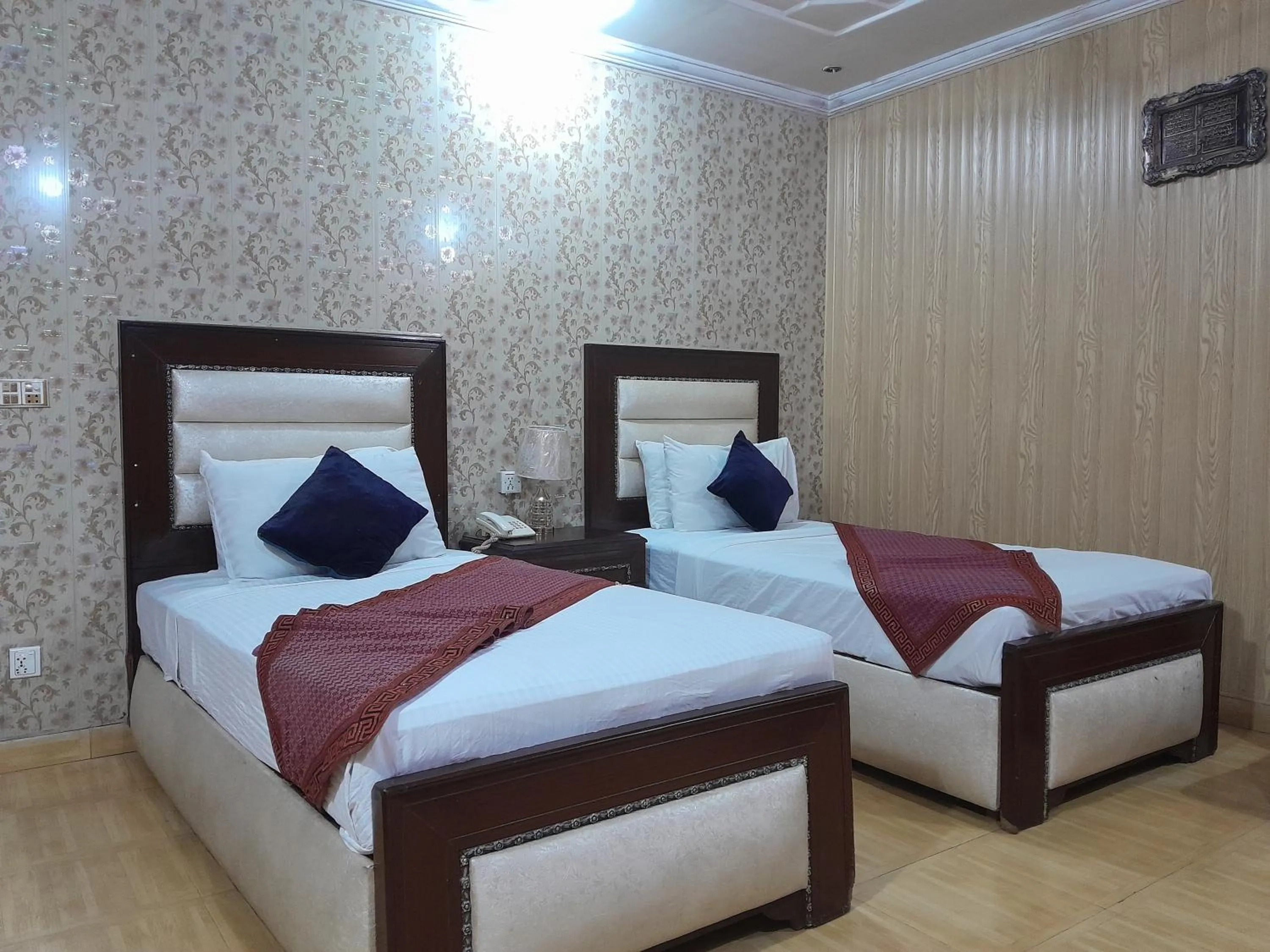 Bed in Hotel Tulip INN Faisal Town
